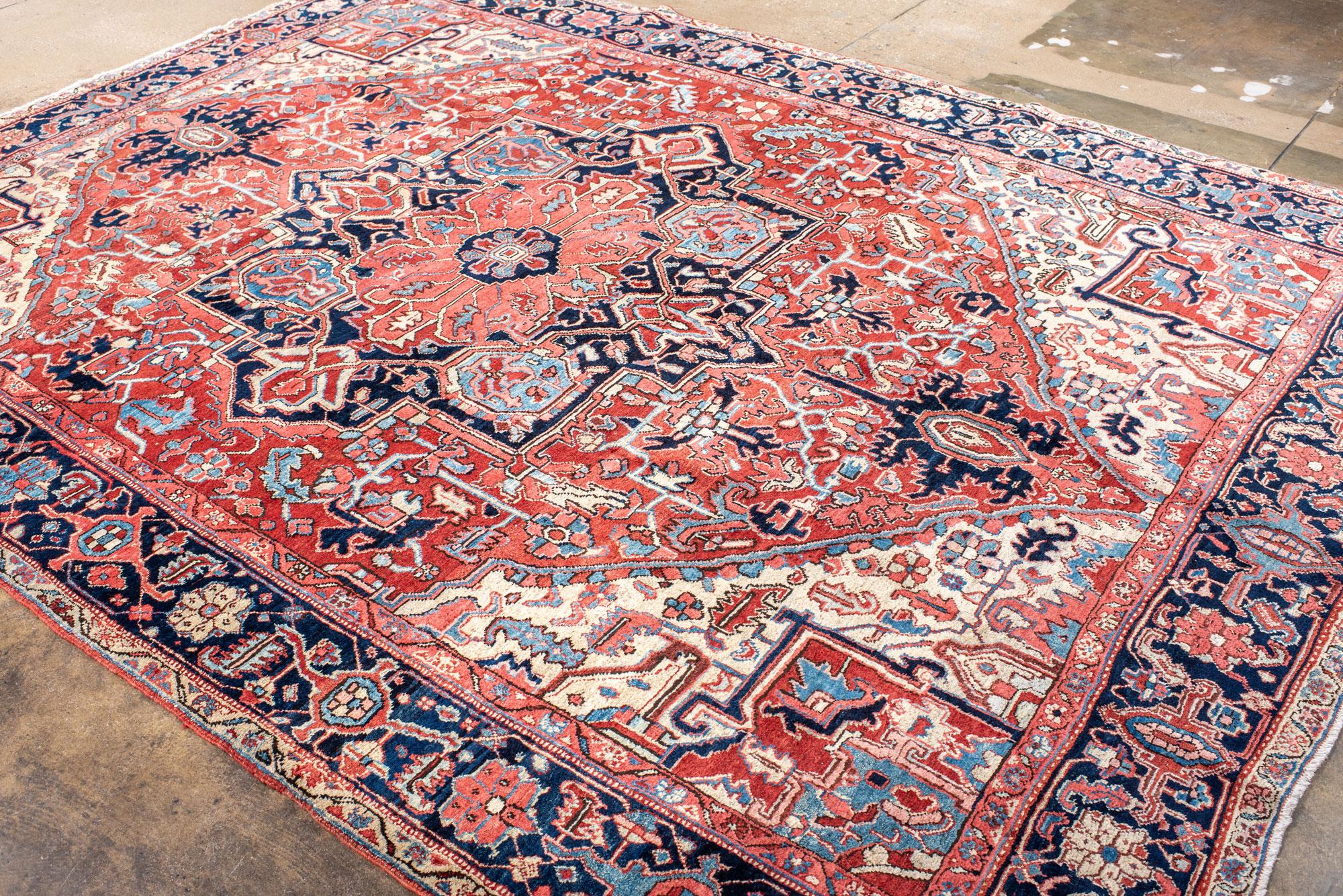 Classic Antique Heriz Carpet with a Red Field and Blue Accents For Sale 1