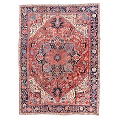 Classic Antique Heriz Carpet with a Red Field and Blue Accents