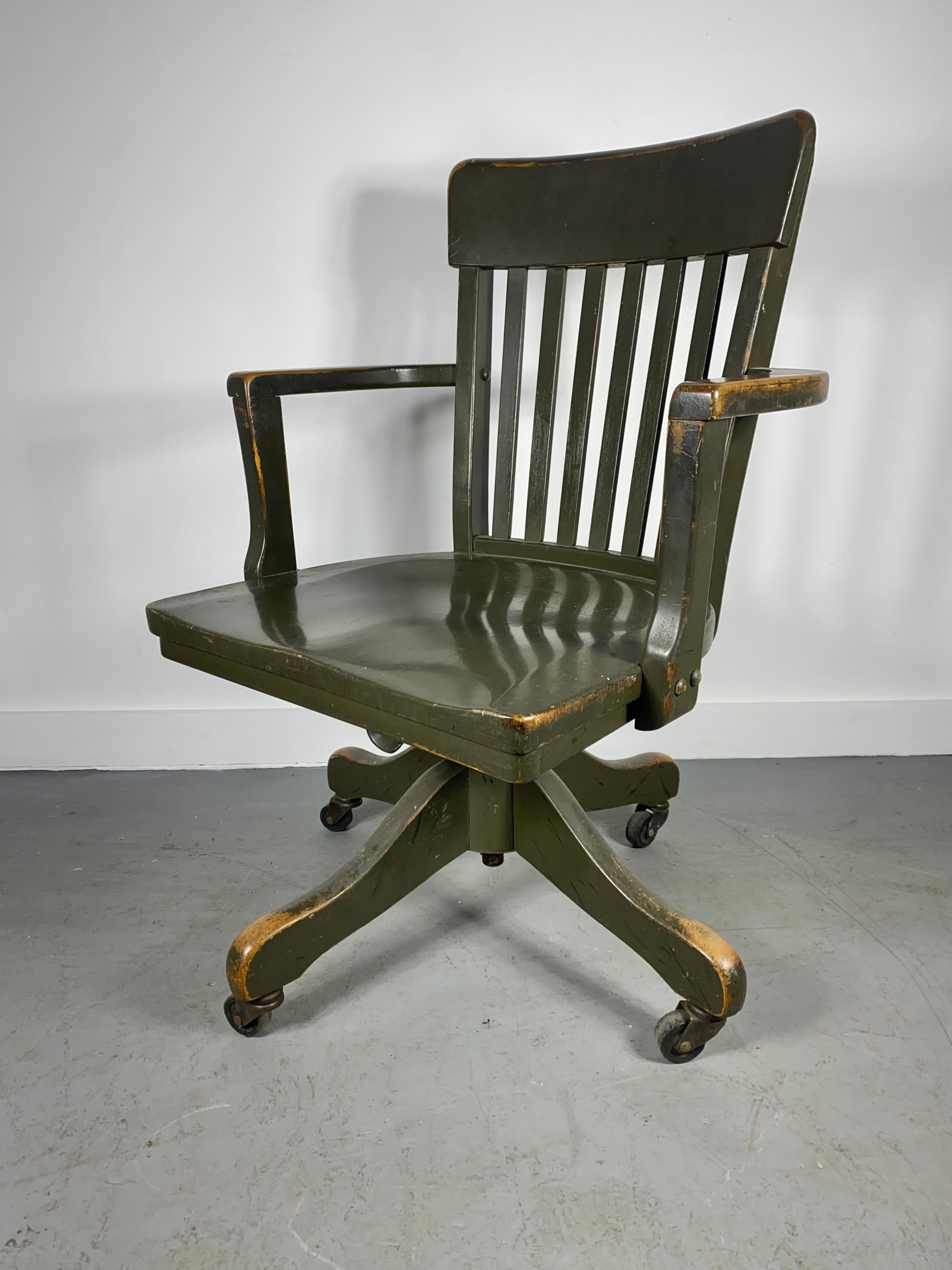 Classic Antique American Industrial Tilt Swivel desk / task chair. attributed to the Sikes Chair Company, Salvaged from CURTISS-WRIGHT CORP. Airplane Division. retains original Curtiss Wright label, Wonderful original patina, great old army green