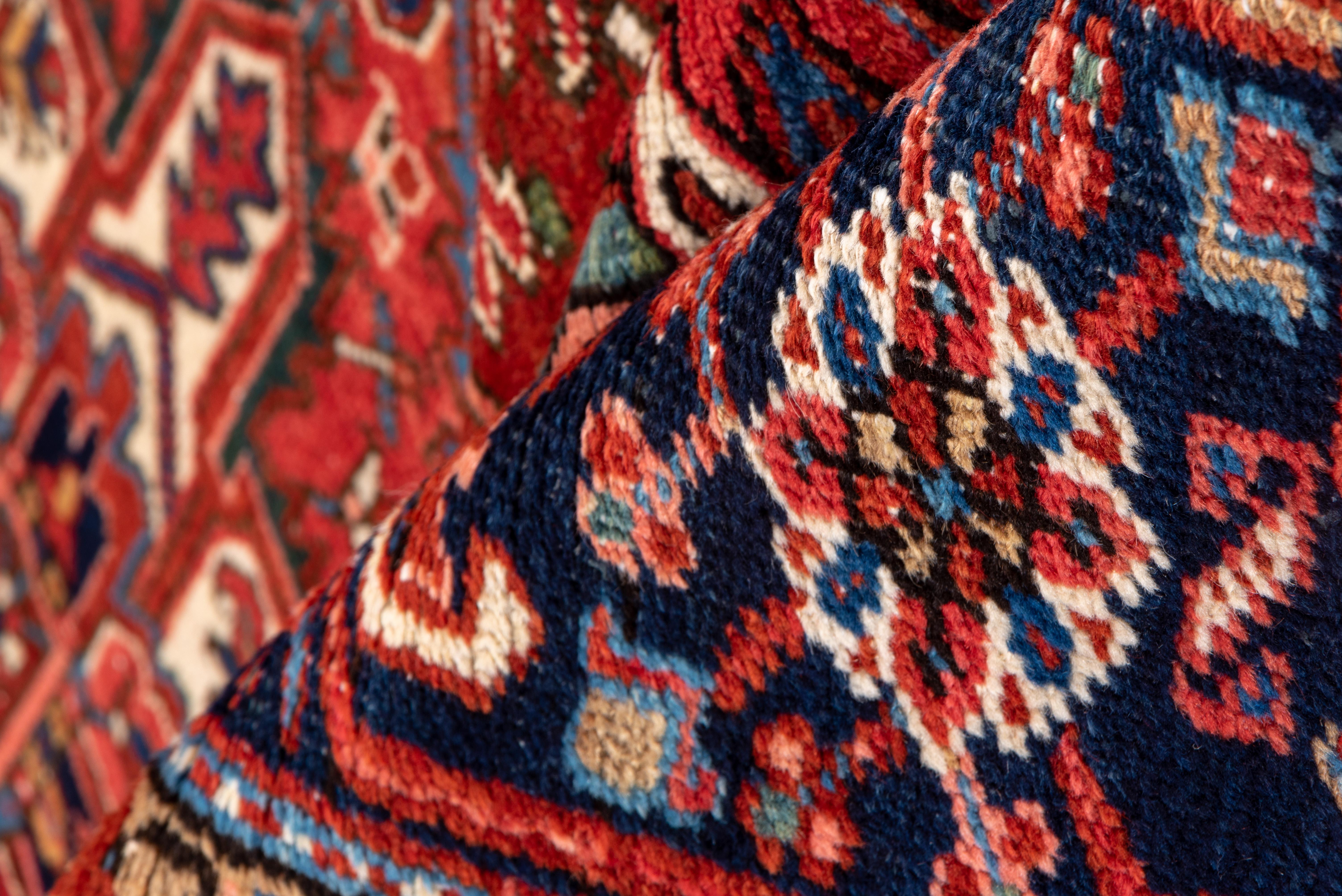 Heriz Serapi Classic Antique Persian Heriz Rug with Warm Tones, Circa 1930s