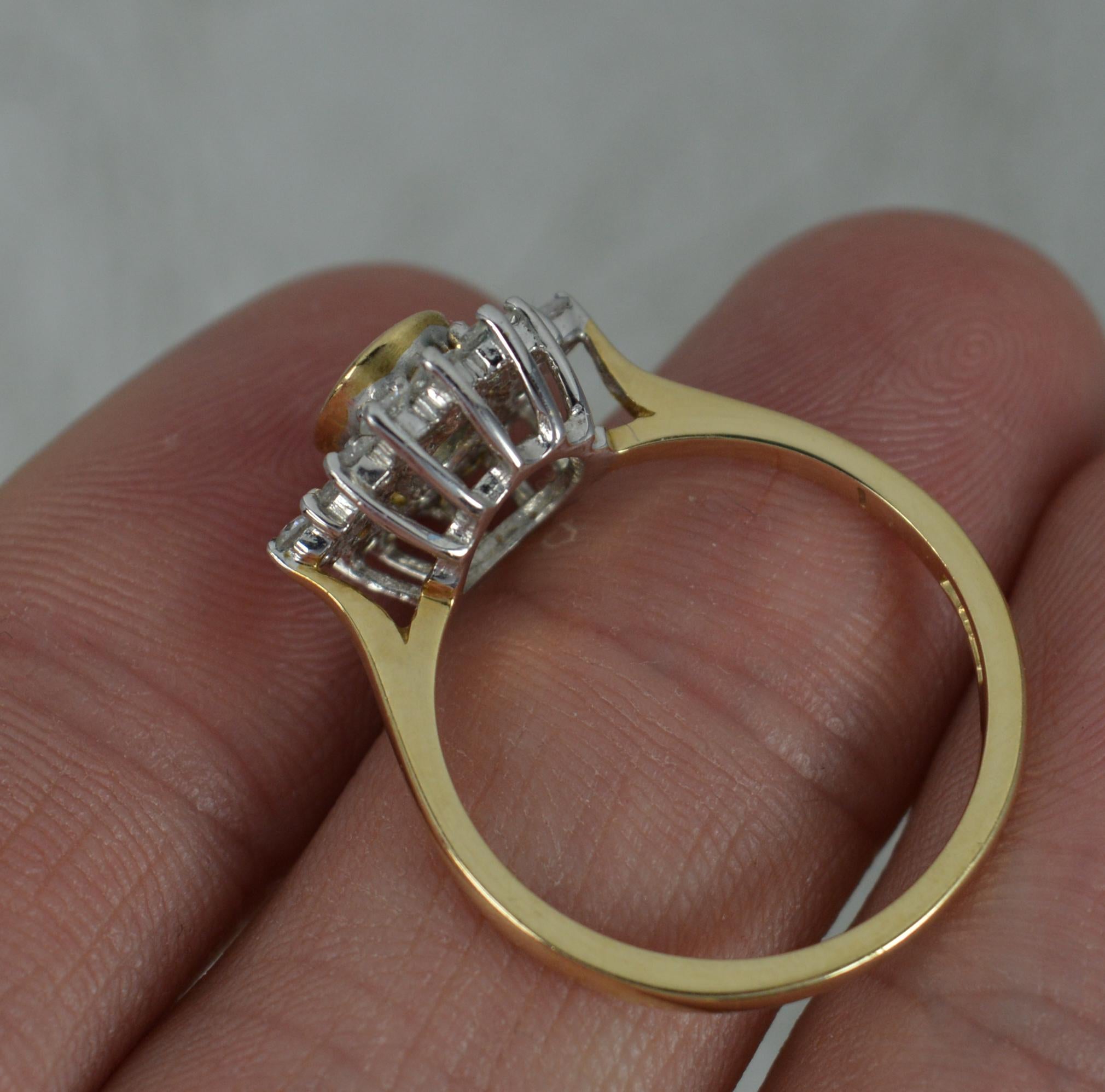 Oval Cut Classic Aquamarine & 0.48ct Diamond 9ct Gold Cluster Ring
