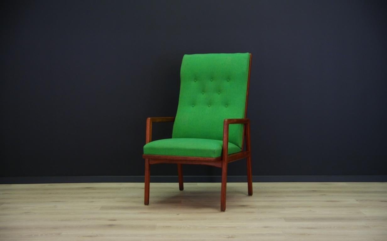 Vintage armchair from the 1960s-1970s. Beautiful straight line, Scandinavian design. Armchair upholstered with the new fabric. Fantastic teak armrests. Armchair in good condition (small scratches and dings on construction are