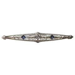 Classic Art Deco Elongated 14 Karat 2-Tone Pin with and Diamond and Sapphires