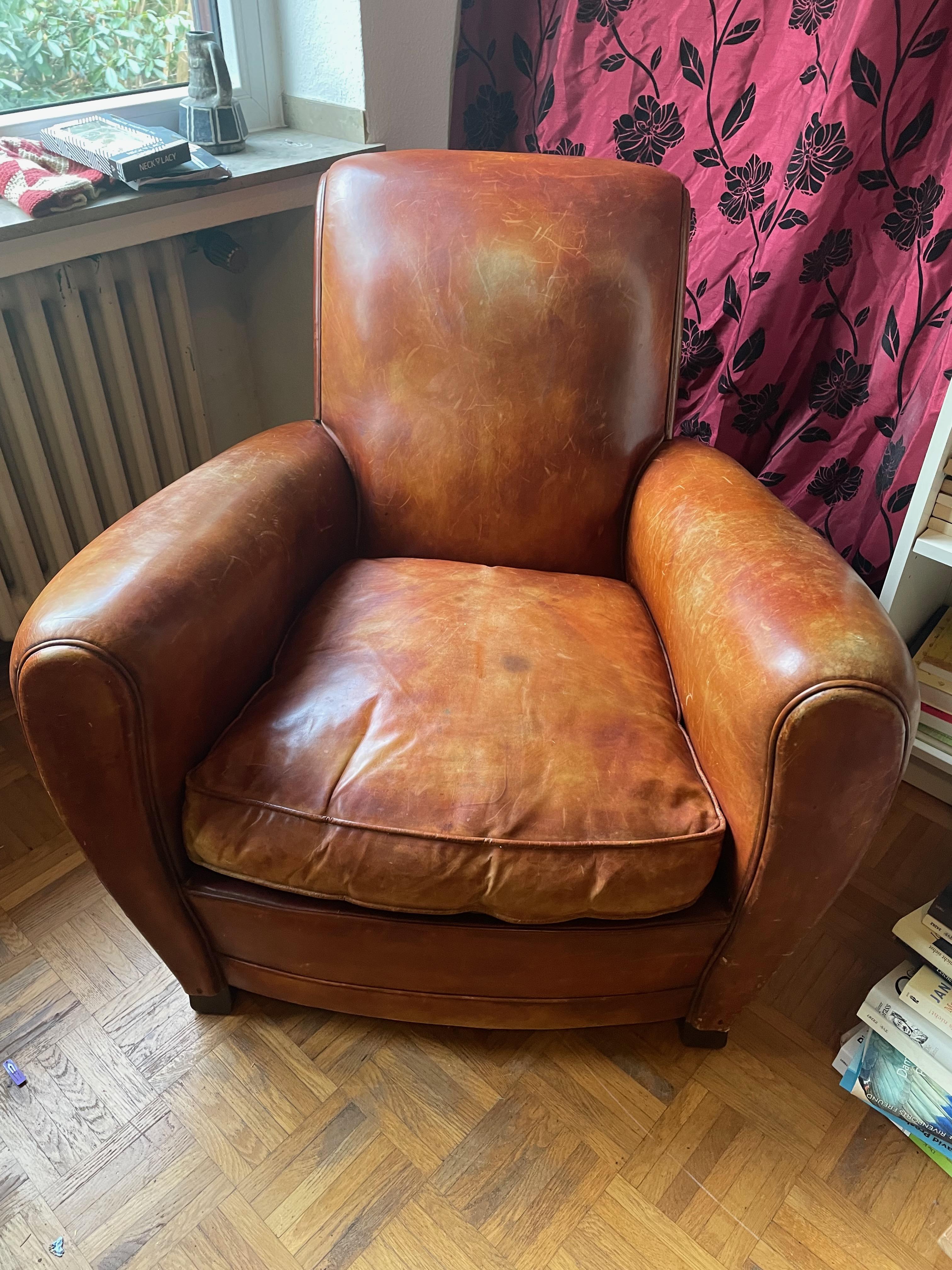 Hand-Crafted Classic Art Déco leather upholstered brown Club Chair. France 1930s. For Sale