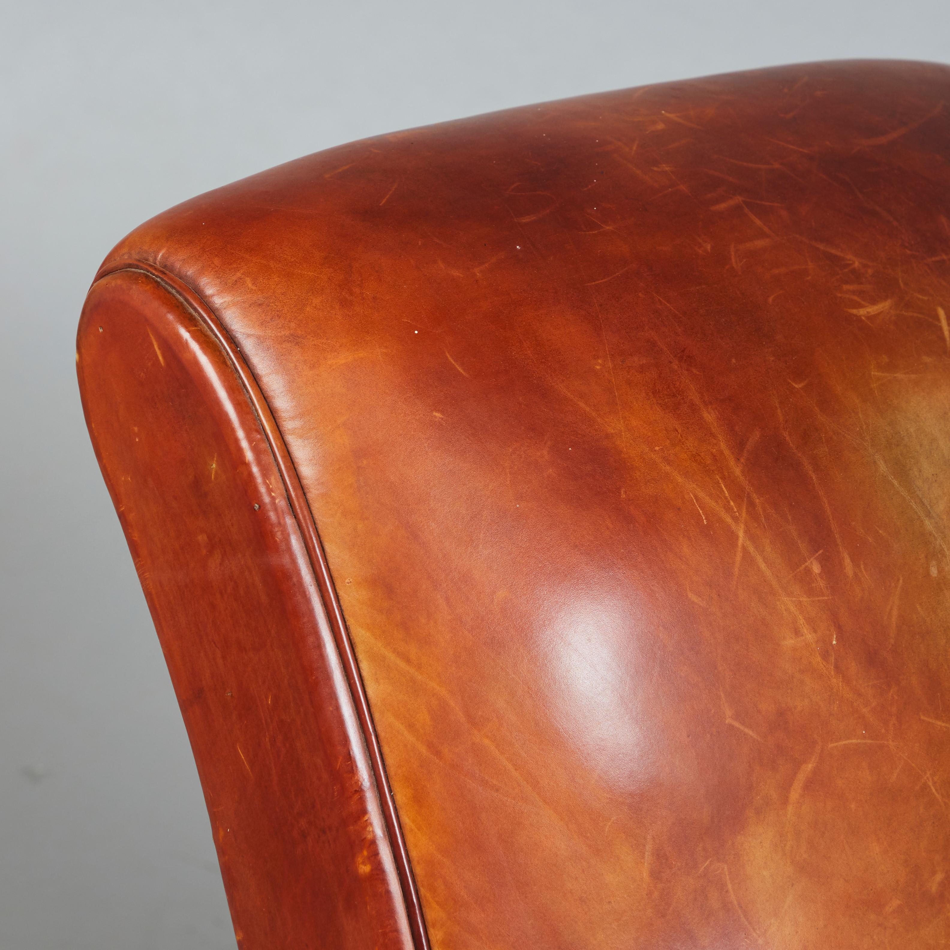Mid-20th Century Classic Art Déco leather upholstered brown Club Chair. France 1930s. For Sale