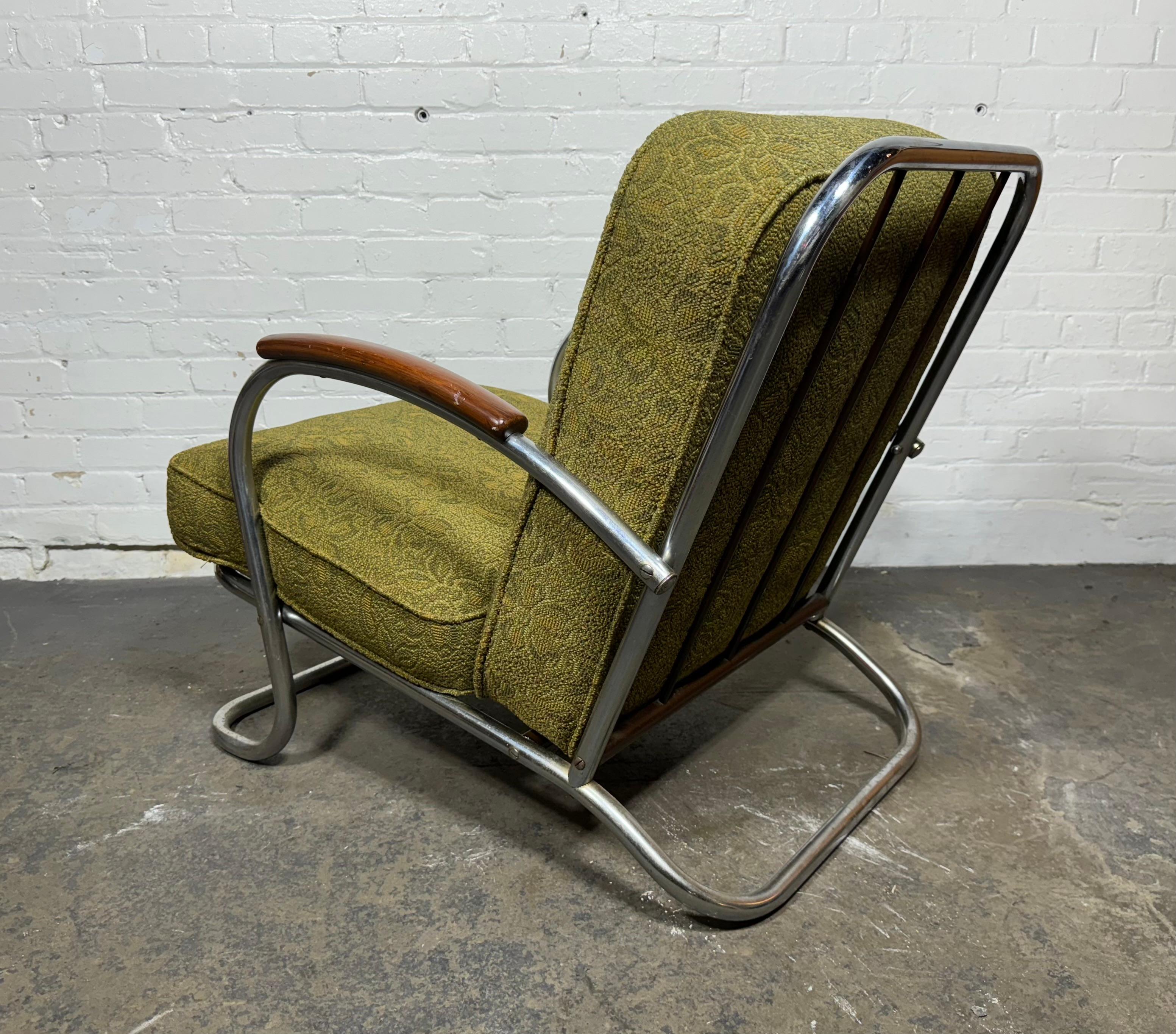 Classic 1930s Art Deco / Machine age lounge chair designed by Kem Weber. Kem Weber (1889-1963) was a German-born architect and furniture designer.
Tubular chrome frame  and cushions. Extremely comfortable. Age appropriate wear, minor finish loss to