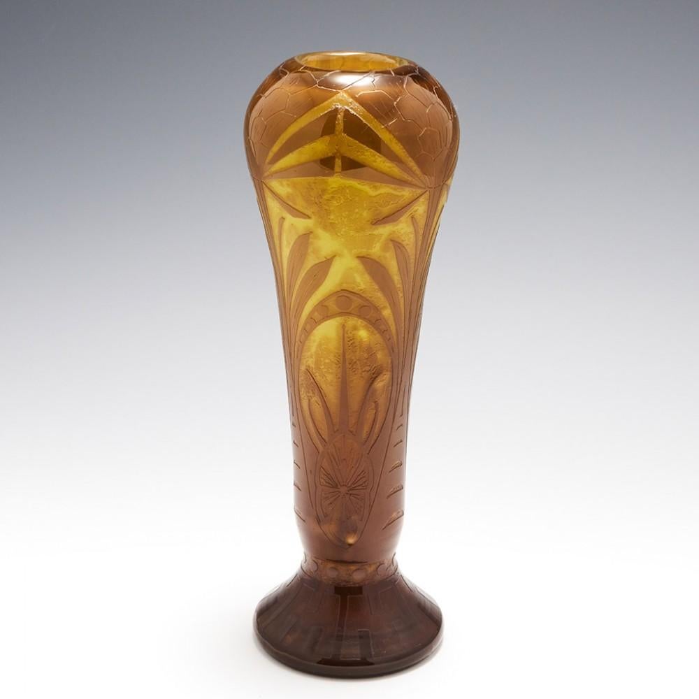 A Classic Art Deco signed Legras vase from 1925 -1935 made at the Verreries et Cristalleries de St Denis et Pantin Reunies, Paris, France. Olive green intalglio cut and acid etched stylised floral design with geometric pattern and Legras signature