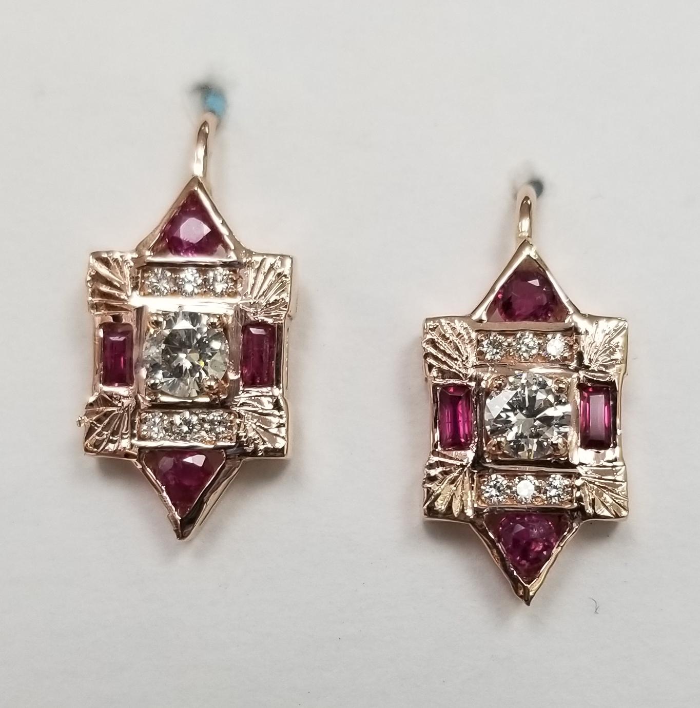  Classic art deco style inspired earrings with beautiful red rubies and round cut diamonds crafted in 14K rose gold.
Specifications:
    main stone: 2 round diamond .46pts.
    other diamonds: 12 round diamonds .15pts.
    additional: 4 ruby