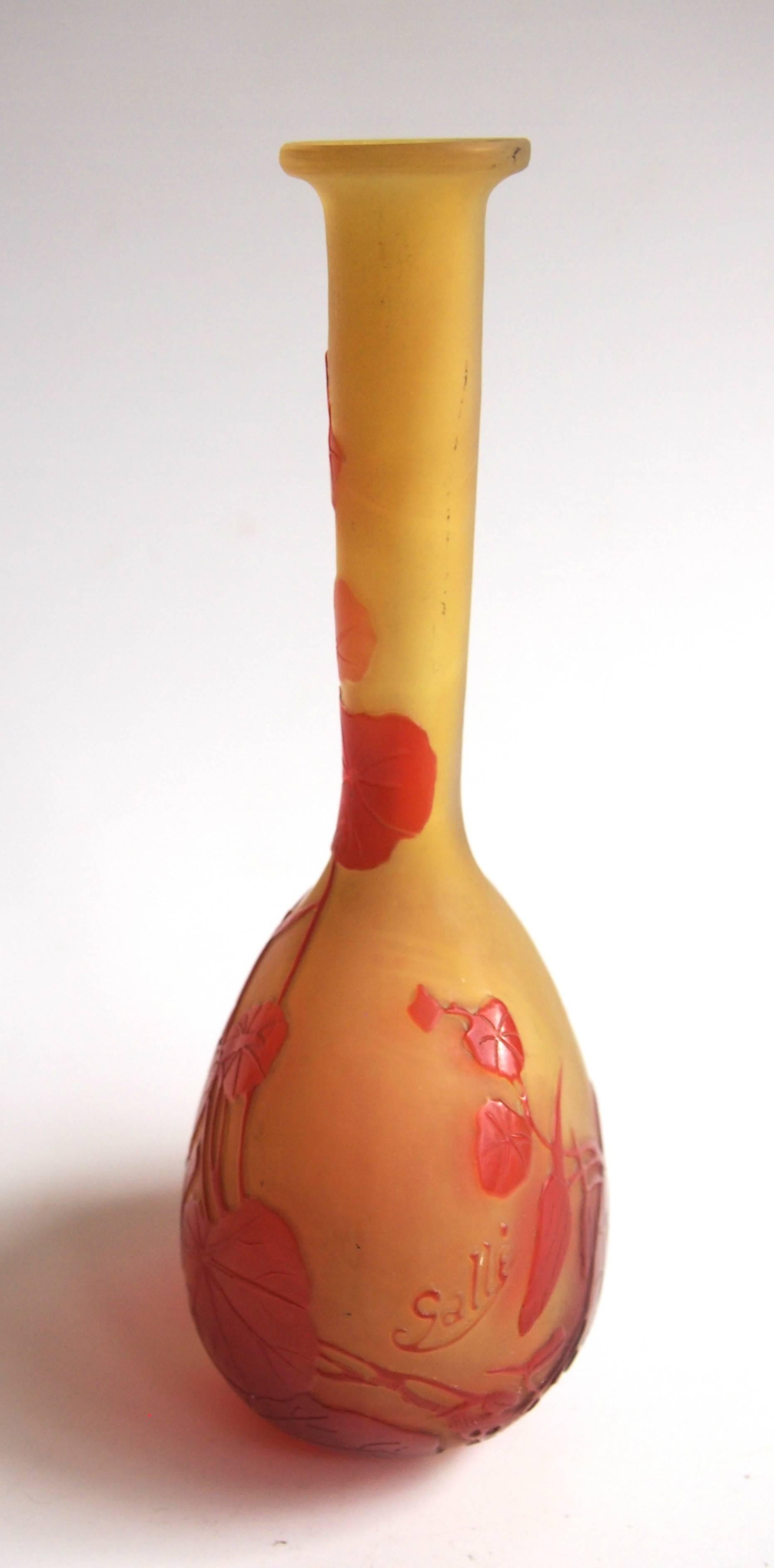 Classic Art Nouveau Emile Galle 'Banjo' vase, depicting Nasturtium blooms in vibrant red over orange. Emile Galle Cameo Banjo vases (so called because they vaguely resemble that shape) are amongst the most collected of Emile Galle shapes with many