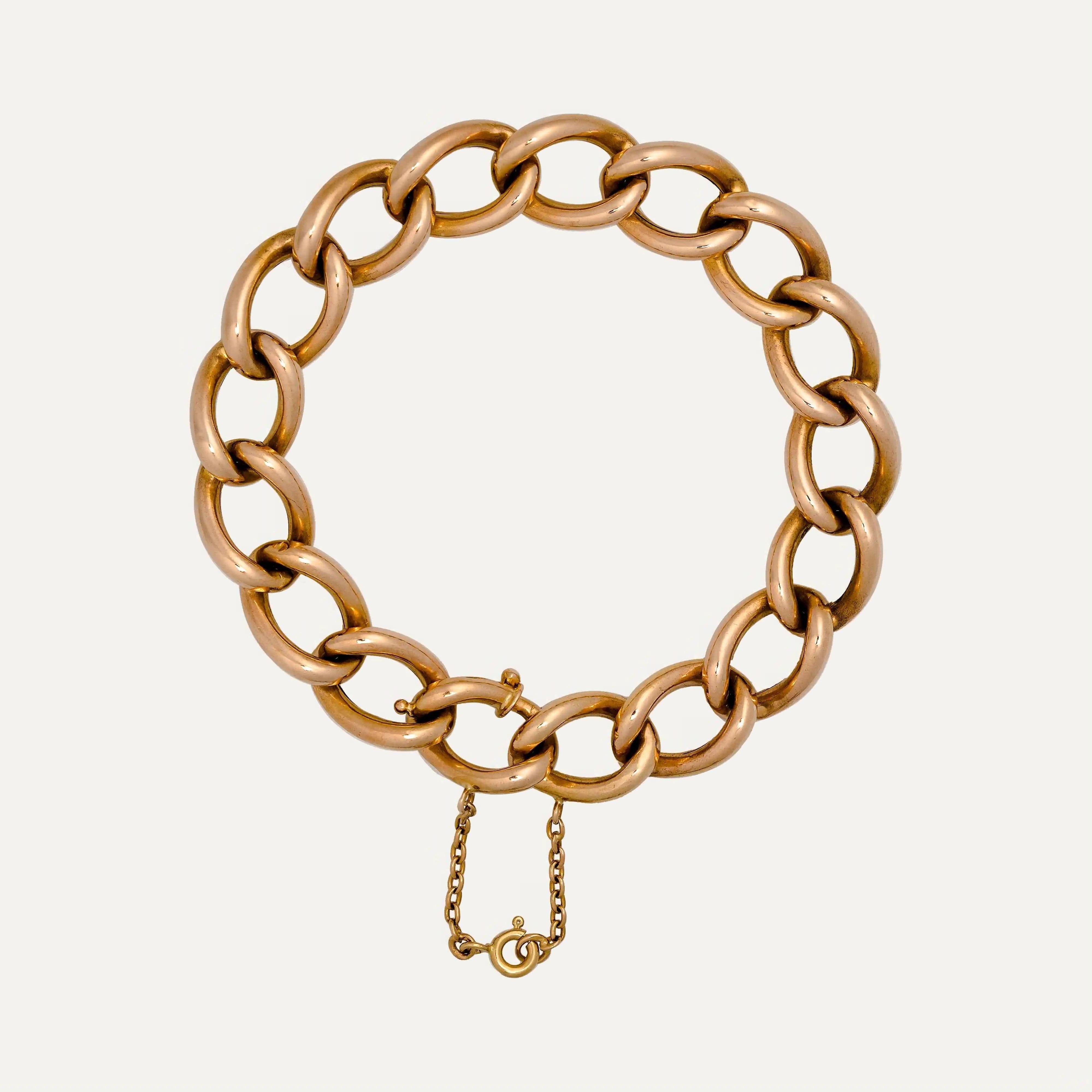 Bracciale in oro rosa 19,2 kt - 800 ‰ con maglie ovali articolate e maglia lucida. Chiusura a maglia ovale
uguale alla rete, con catena di sicurezza.
