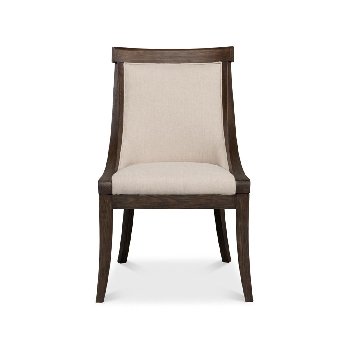 Sedia da pranzo classica in frassino, un classico senza tempo che aggiunge drammaticità, attira l'attenzione e spesso mette in risalto tutti gli elementi di design di una stanza. Con cornice in frassino a vista splendidamente rifinita e una lussuosa