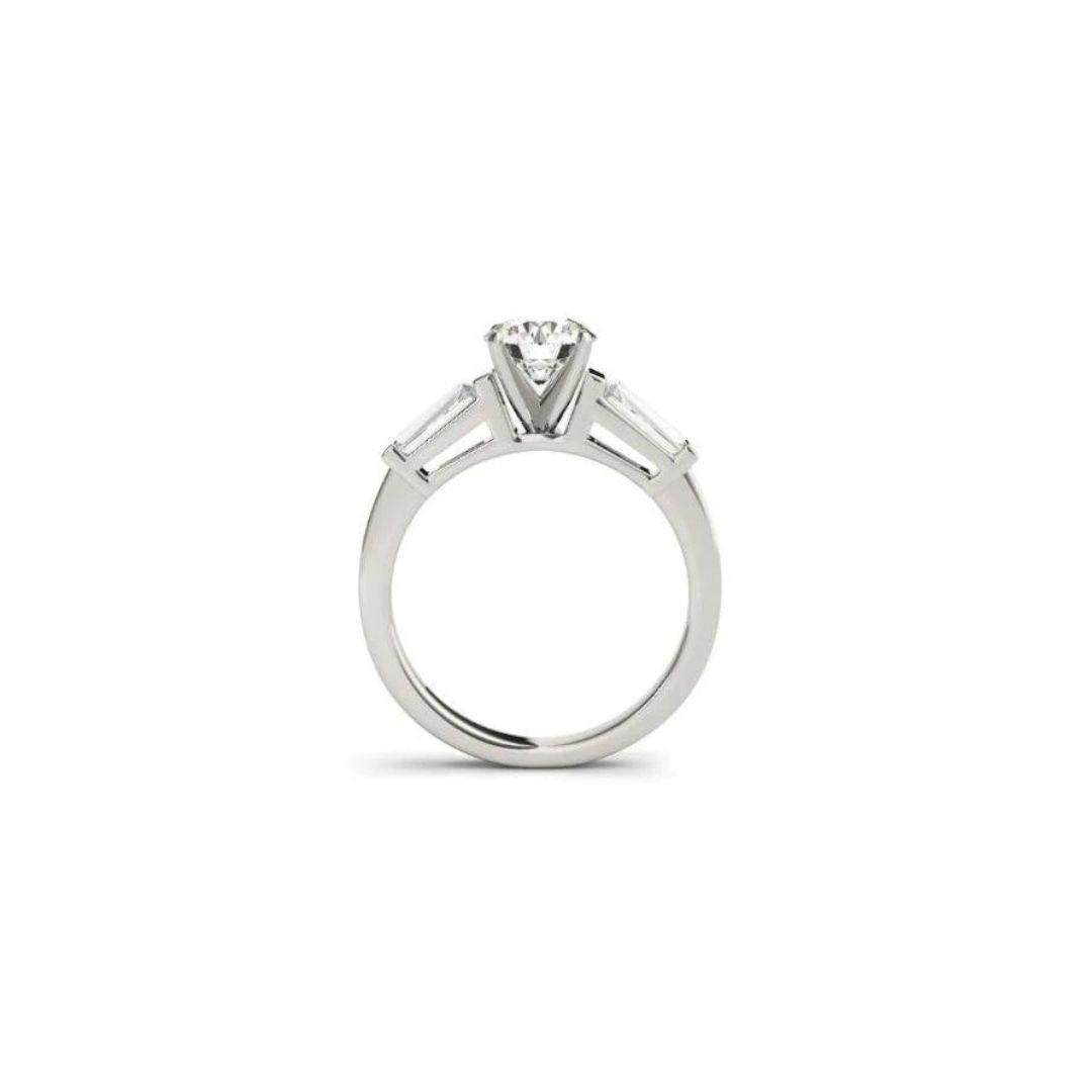 Classic Tapered Baguette Fancy Solitaire Diamond Engagement Mounting in 14k White Gold﻿. Beautiful tapered baguette diamonds flank the sides of the center stone, with a total carat weight of 0.15 ctw, H  color, SI1 clarity. Center diamond NOT