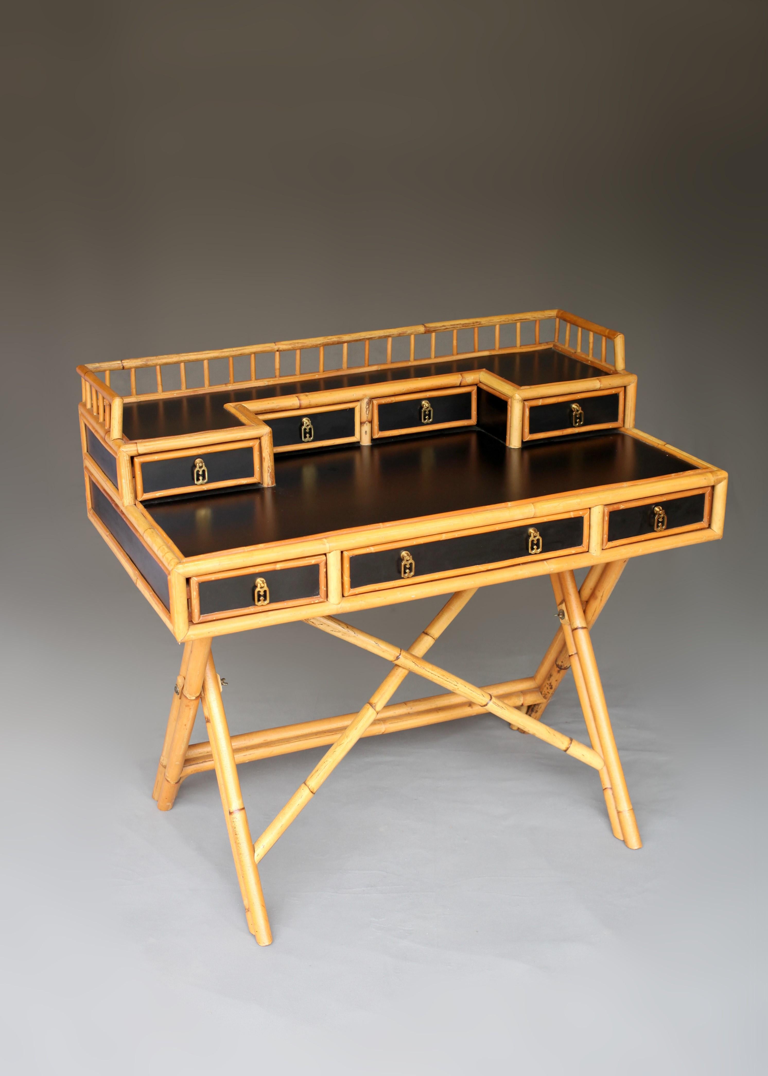 East meets West, Bamboo meets Lacquer. Add a generous helping of mid-century charm to your surroundings with this Bamboo & Lacquer Campaign Desk by Murio. Serve your workspace needs with this delightful piece that perfectly balances practicality