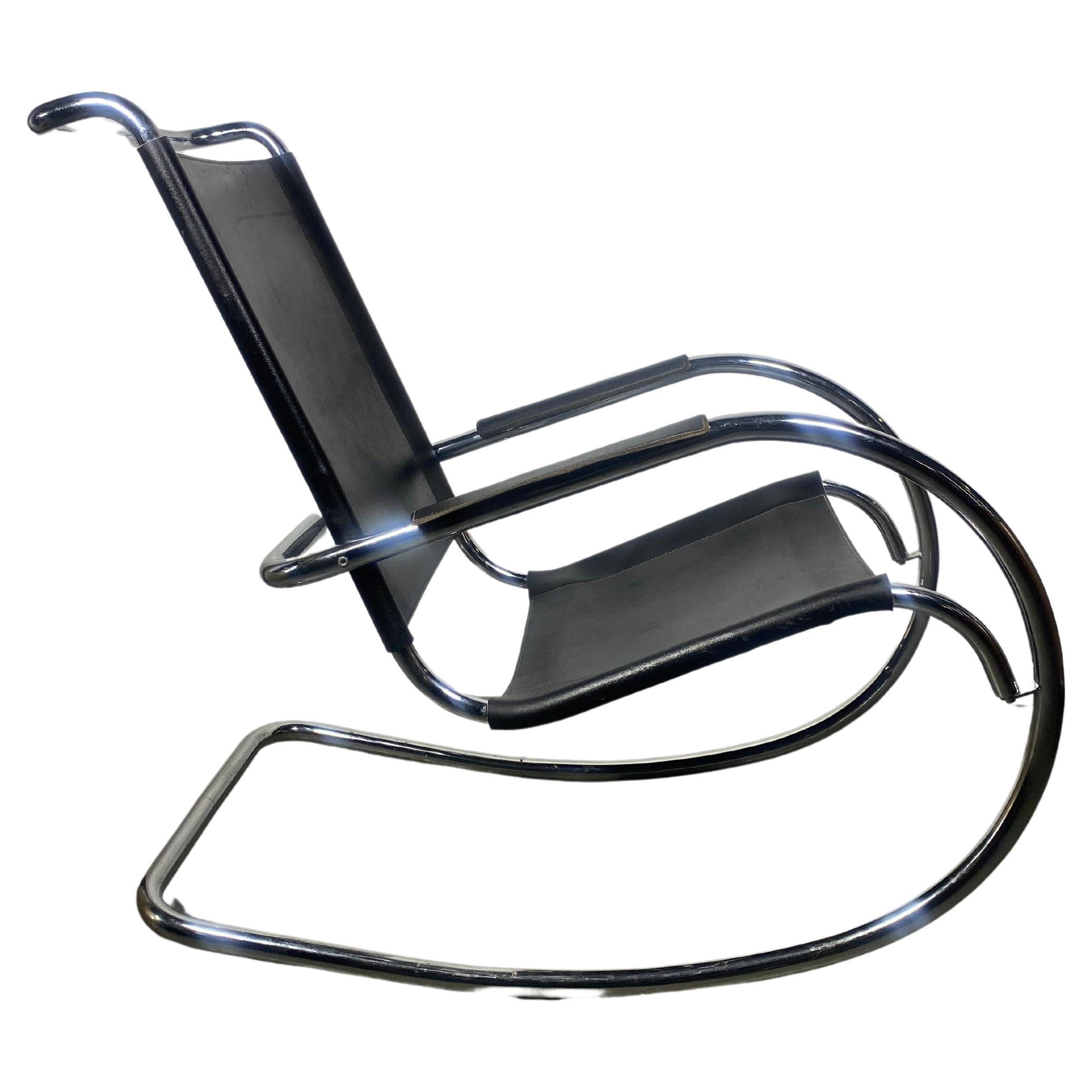 Classic Bauhaus style leather and chrome rocker, after Mies Van De Rohe, made in Italy, wonderful quality and construction, extremely comfortable, retains original MADE IN ITALY label., Hand delivery avail to New York City or anywhere en route from