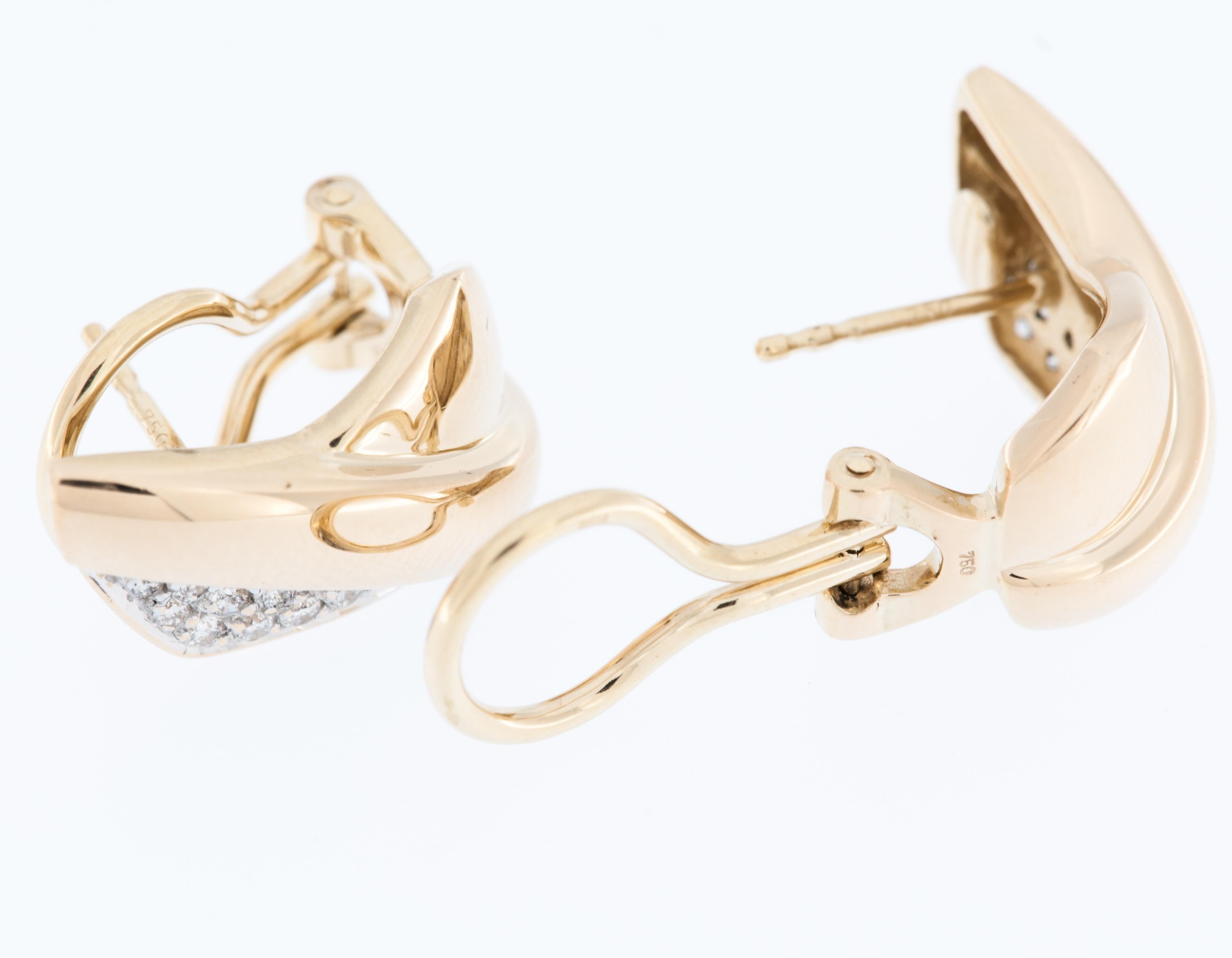 Die klassischen belgischen Ohrringe aus 18-karätigem Gold mit Diamanten, die aus einer Kombination von Gelb- und Weißgold bestehen, sind ein zeitloses und elegantes Accessoire. 

Die Ohrringe sind aus hochwertigem 18-karätigem Gold gefertigt und