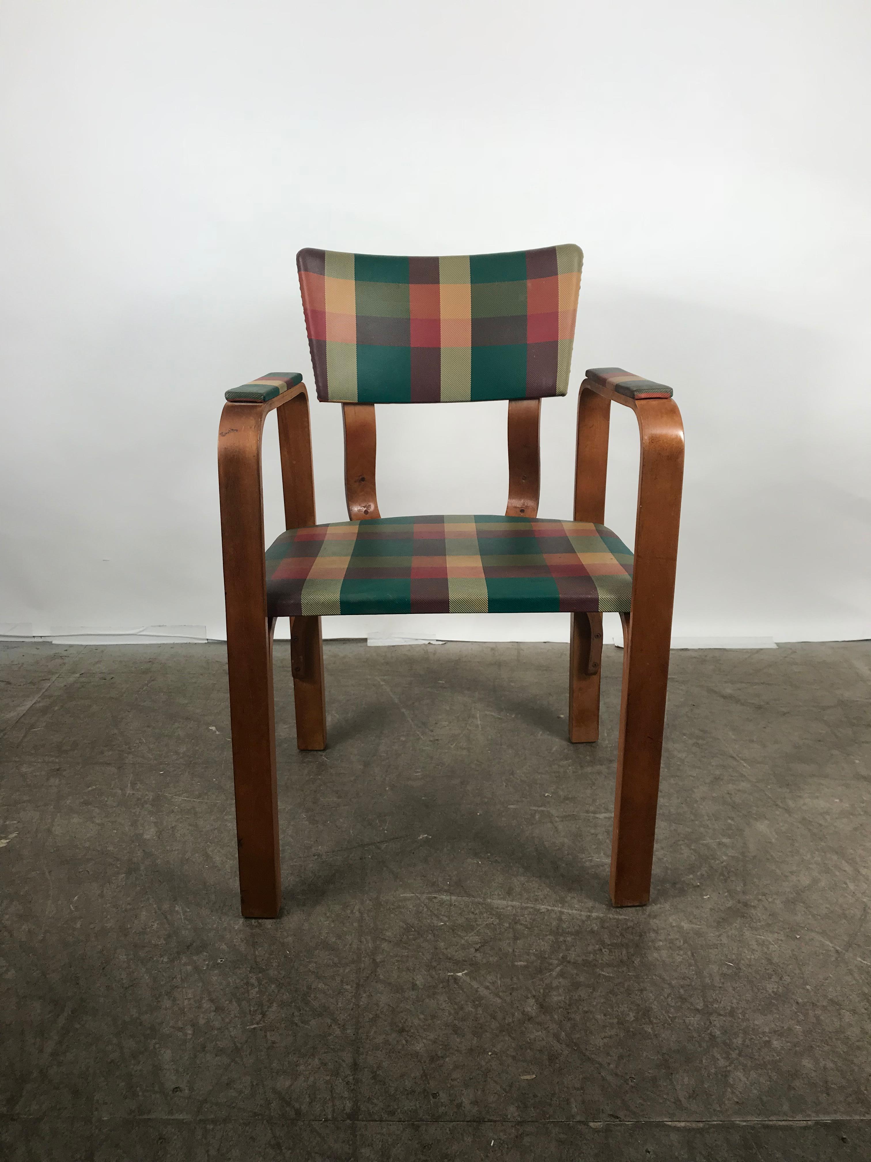 Classic bentwood armchair with original plaid oil cloth by Thonet brothers 1940s, extremely comfortable, chair in remarkable original condition, minor discoloration to plaid. Retains original Thonet label, arm height 27 inches.