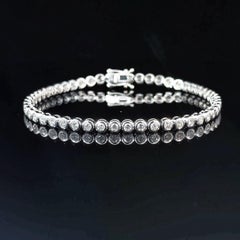 Classic Bezel Set Round Brilliant Diamond Tennis Bracelet, 2.19 Carats in 18k