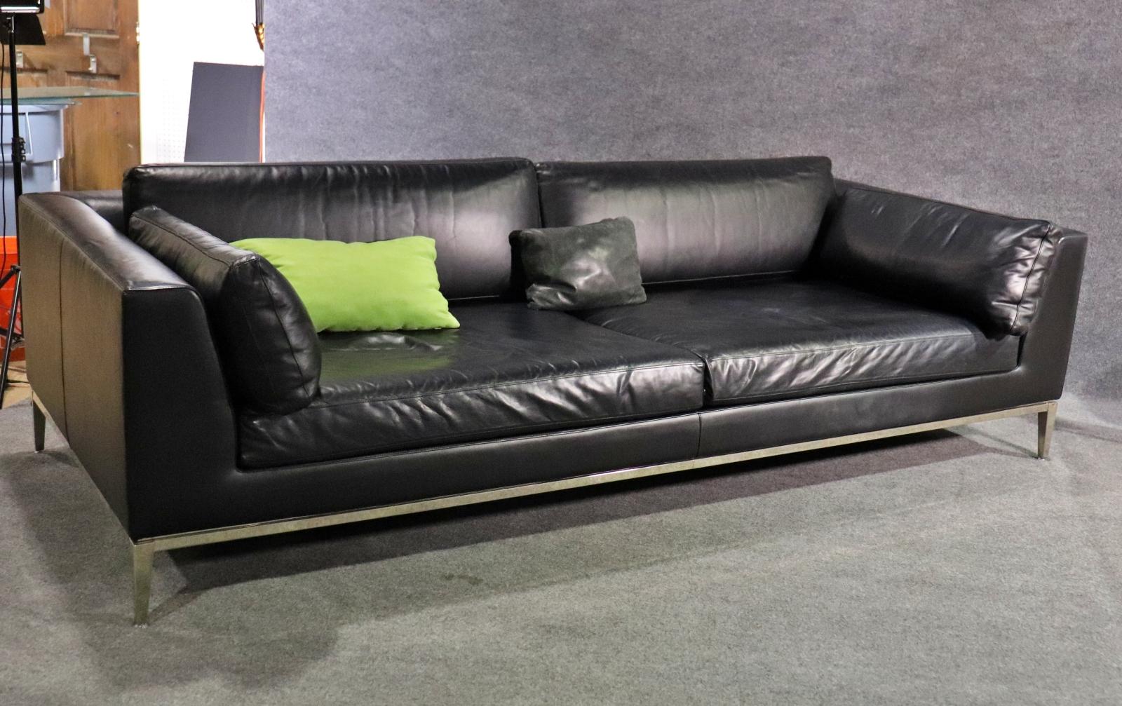 Classic Black Leather & Chrome Frame Modern Sofa.  Loose back and side cushions, tapered legs exposed continuous frame.  Nice clean design and is in overall good condition. 

Measures : 27 3/8