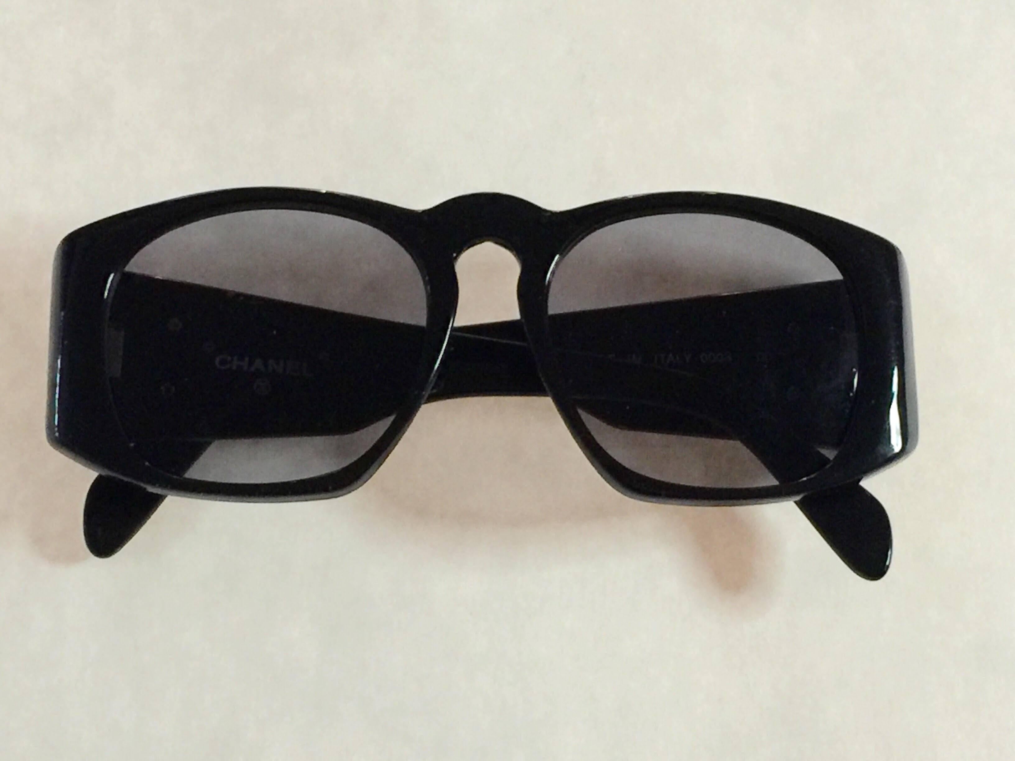 No wardrobe should be without these Classic Black Quilted Plastic CHANEL CC Sunglasses. Marked with appropriate signature as well as visible CC logo, this elegant fashion eyewear quotes the classic black quilted patent leather purses which this
