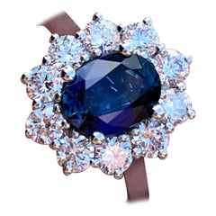Classic Blue Sapphire and Diamond Cluster Engagement Ring