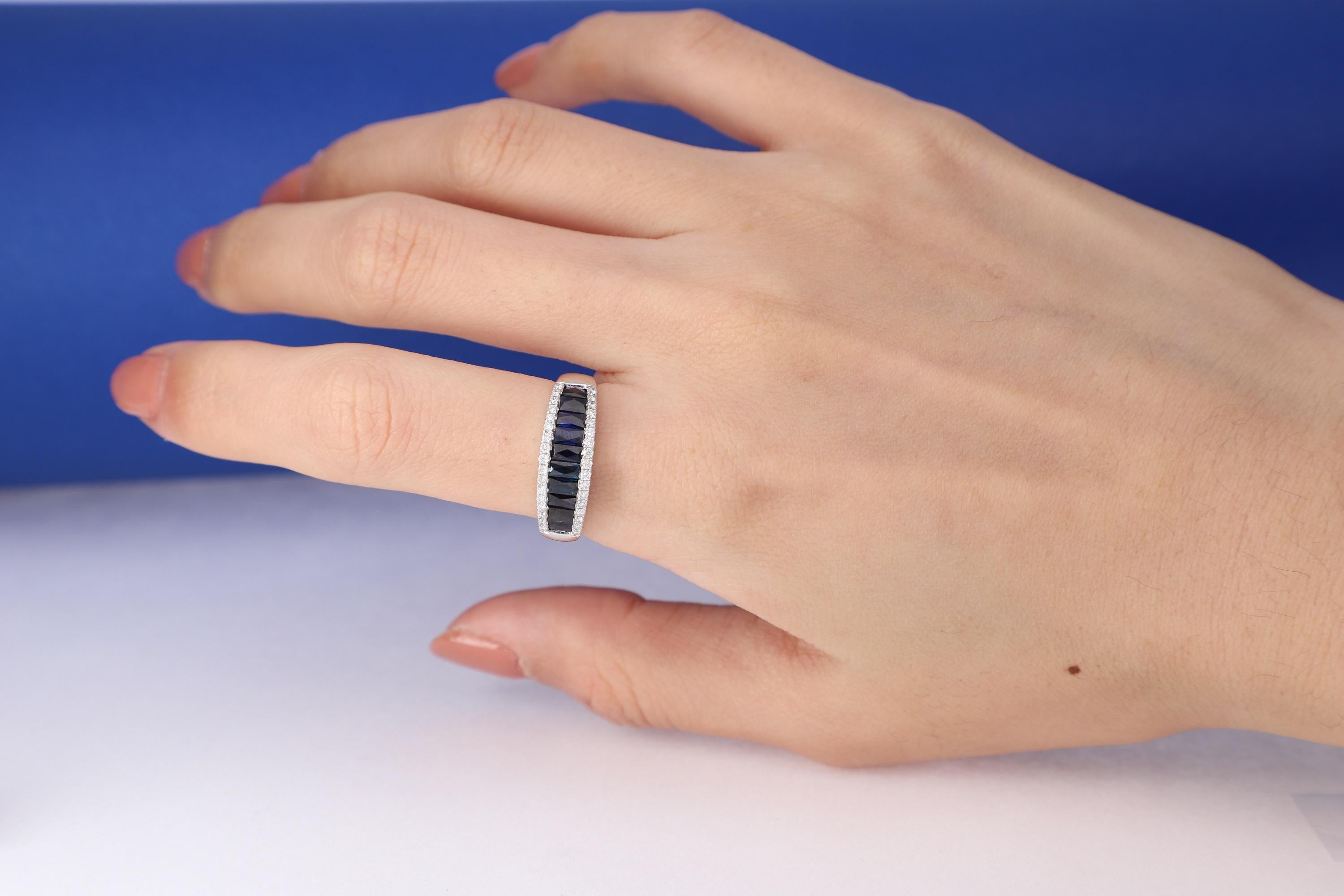 Stunning, timeless and classy eternity Unique Ring. Decorate yourself in luxury with this Gin & Grace Ring. The 10K White Gold jewelry boasts with Baguette-cut 10 pcs 1.40 carat Blue Sapphire and Natural Round-cut white Diamond (34 Pcs) 0.24 Carat