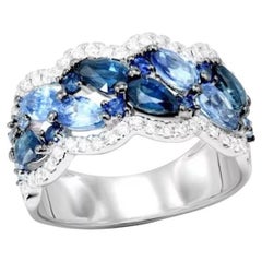Bague classique pour elle en or 18K avec saphir bleu et diamant