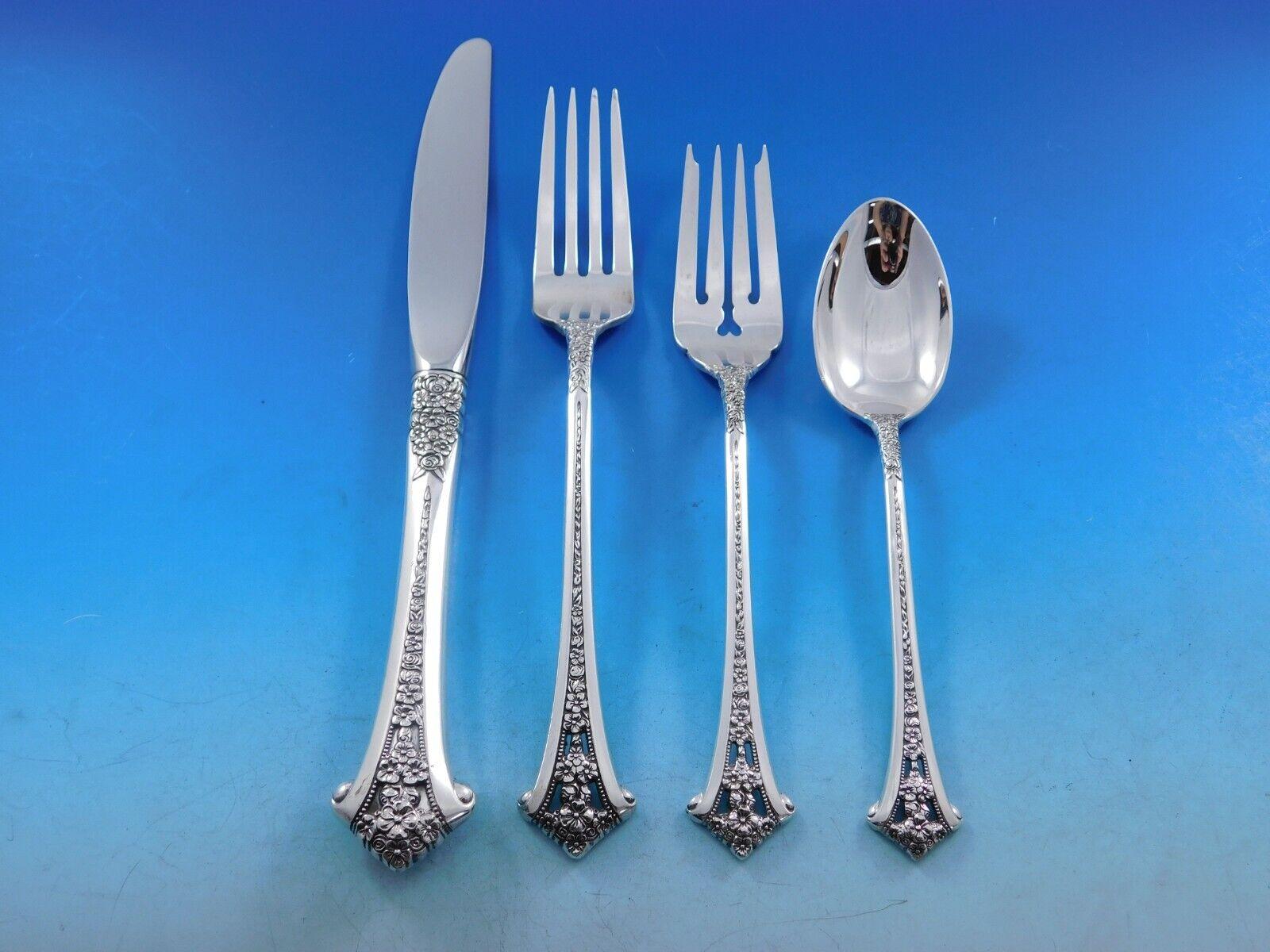 Classic Bouquet by Gorham sterling silver Flatware set, 65 pieces. The handle design is a bouquet of flowers with pierced and beaded detailing. This set includes:

12 Place Size Knives, 9 1/8