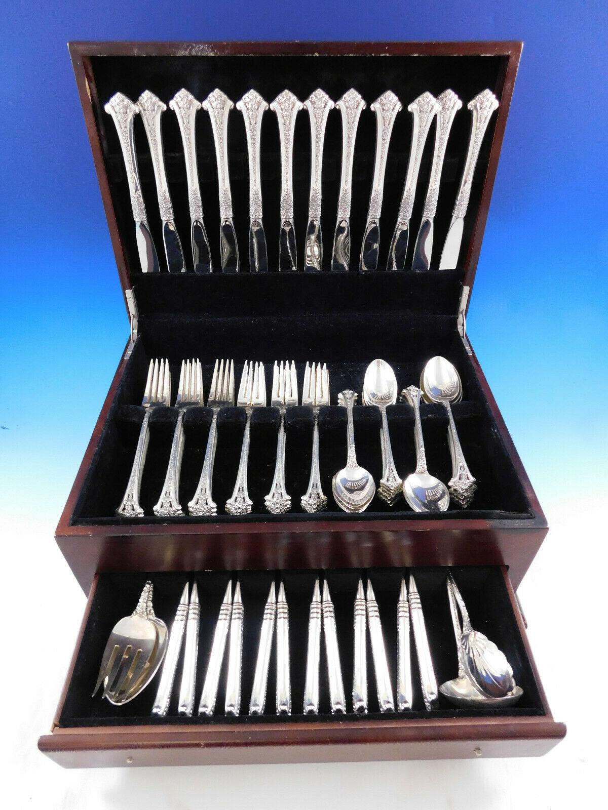 Classic Bouquet by Gorham sterling silver Flatware set, 77 pieces. The handle design is a bouquet of flowers with pierced and beaded detailing. This set includes:

12 place size knives, 9 1/8