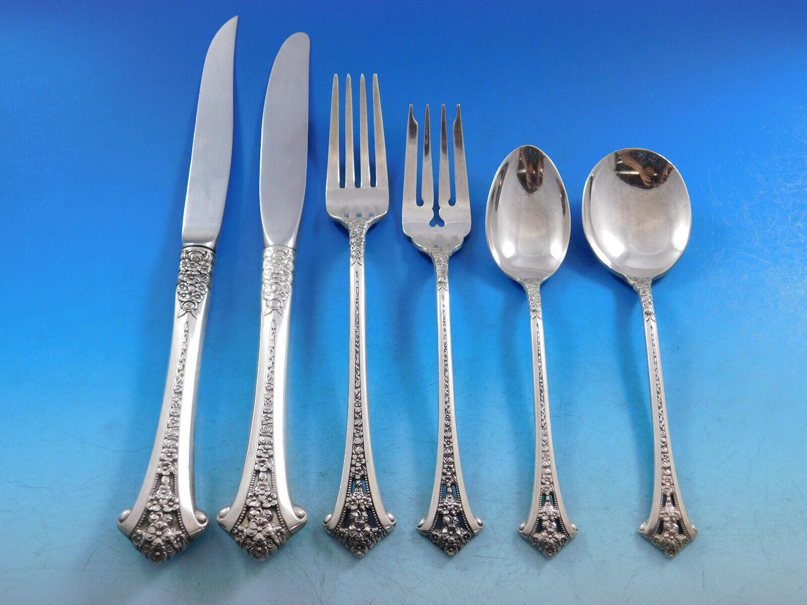 Classic Bouquet by Gorham sterling silver Flatware set, 56 pieces. The handle design is a bouquet of flowers with pierced and beaded detailing. This set includes:

8 Place Size Knives, 9 1/8