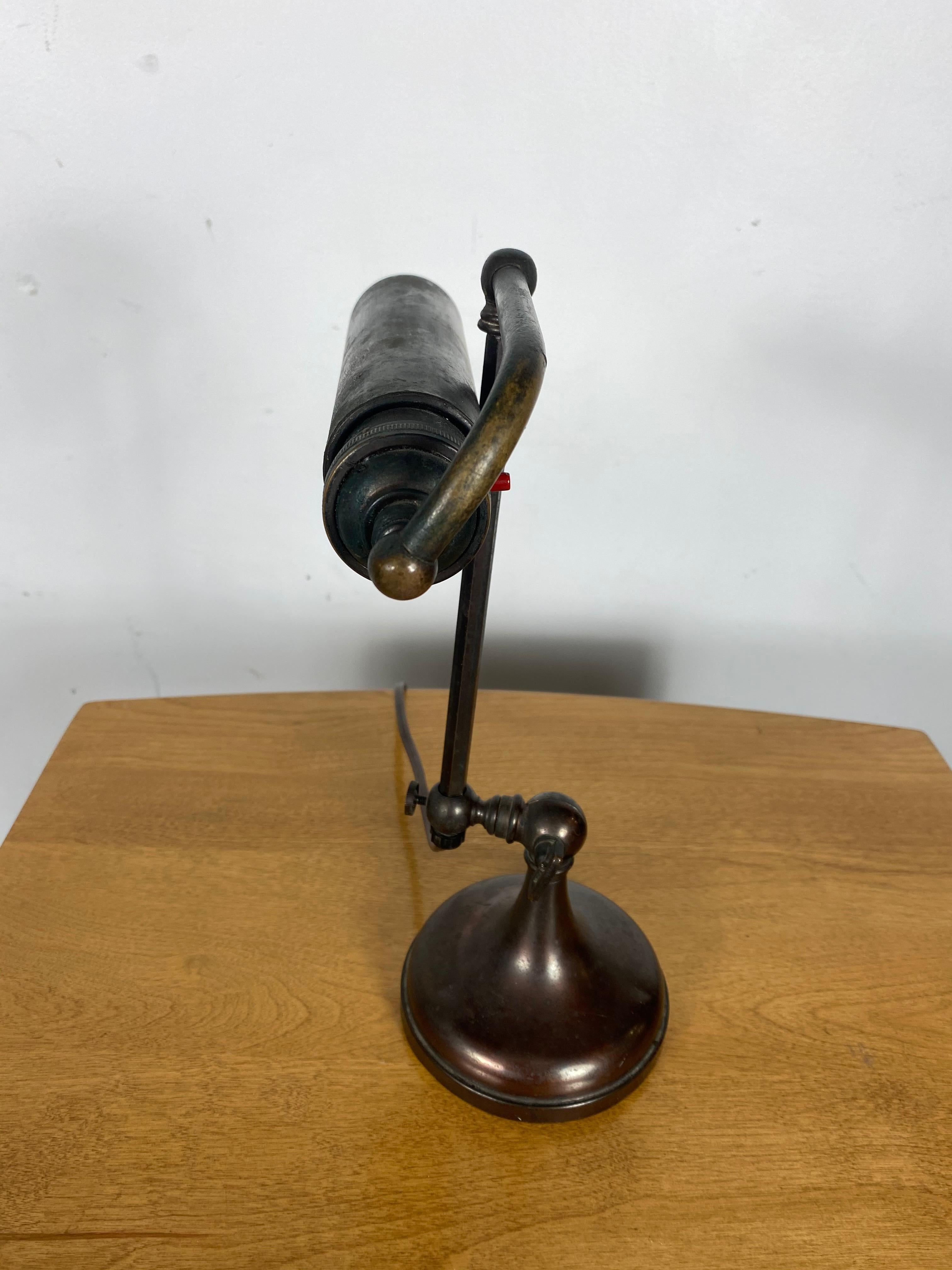 Classic bronze antique piano lamp, fully adjustable.