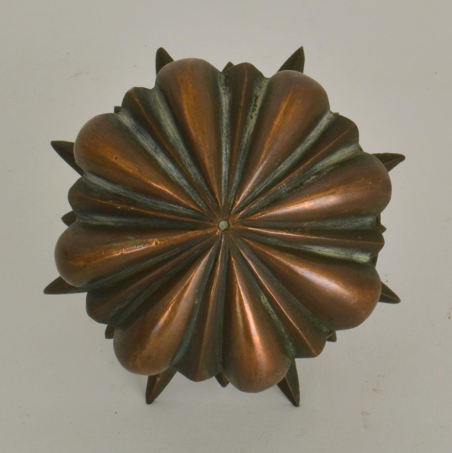 Classical round push and pull bronze door handle with star shape rosette to place on the center of the front door with original patina.
The handles attached to the doors a single fixing to the door with a standard bolts (not supplied) suiting the