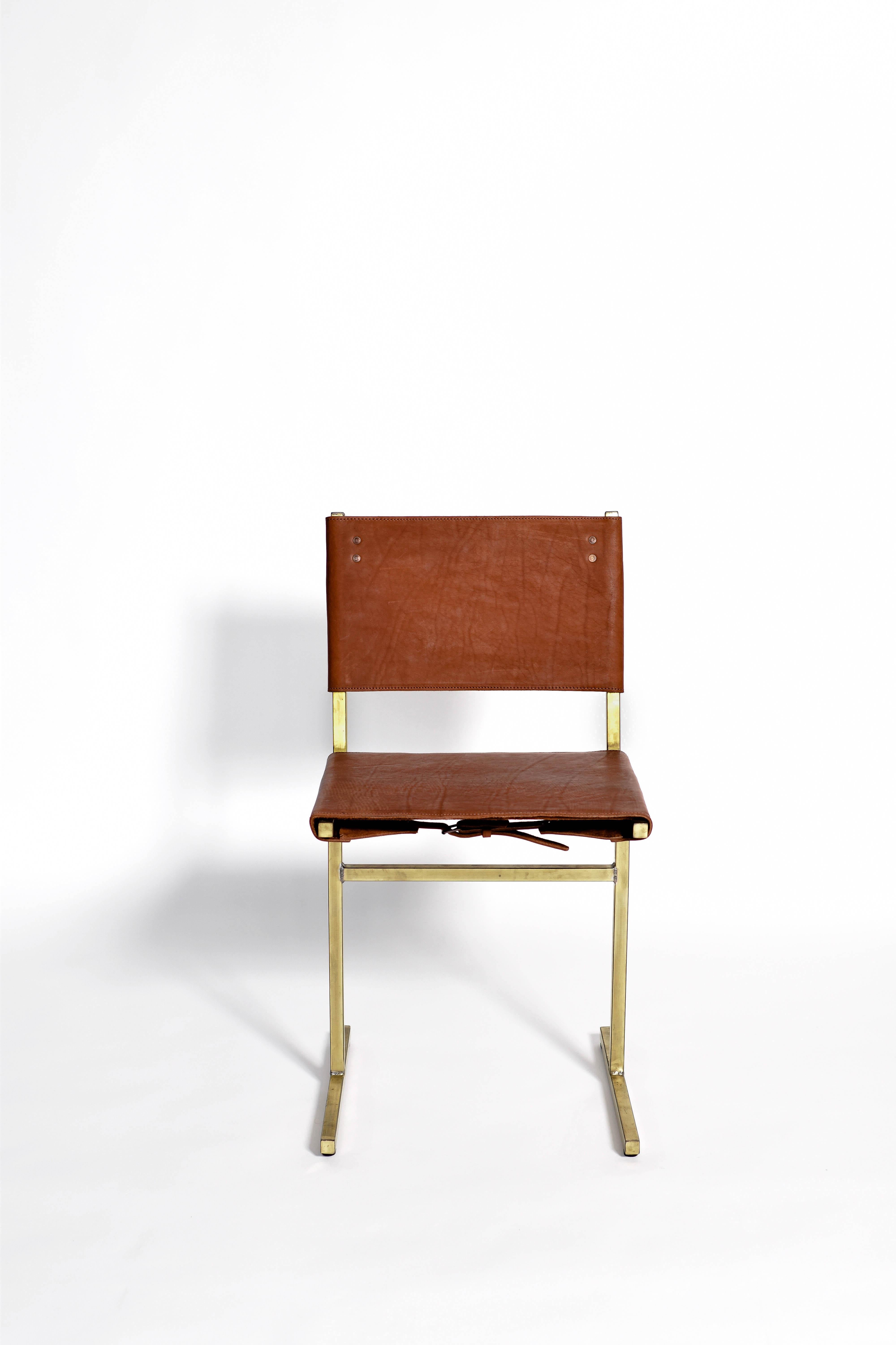 Classic brown and brass memento chair, Jesse Sanderson
Original signed chair by Jesse Sanderson
Materials: Leather, Steel
Dimensions: W 43 x D 50 x H 80 cm 
 Seating height: 47 cm

  

Five lines and a circle – the human body can be as