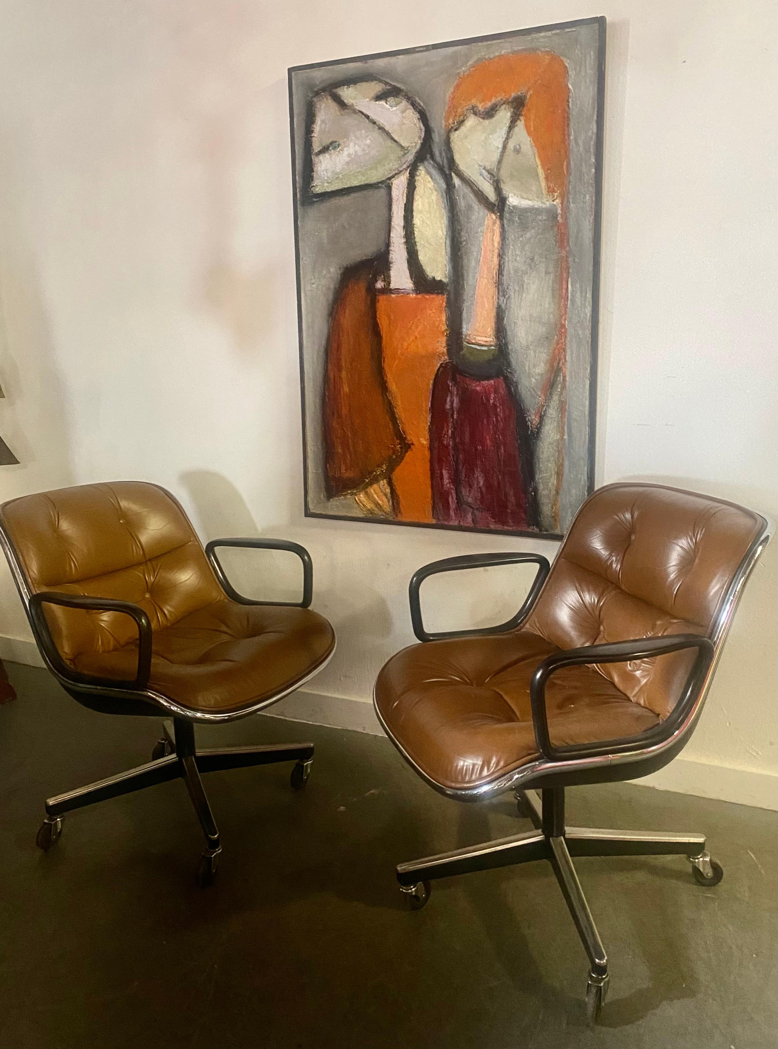 Gorgeous PAIR of vintage original brown leather Pollock desk chairs designed by Charles Pollack for Knoll. Features original brown leather in very good original condition,, Tilt / swivel,, 4- star base on castors.. Hand delivery avail to New York