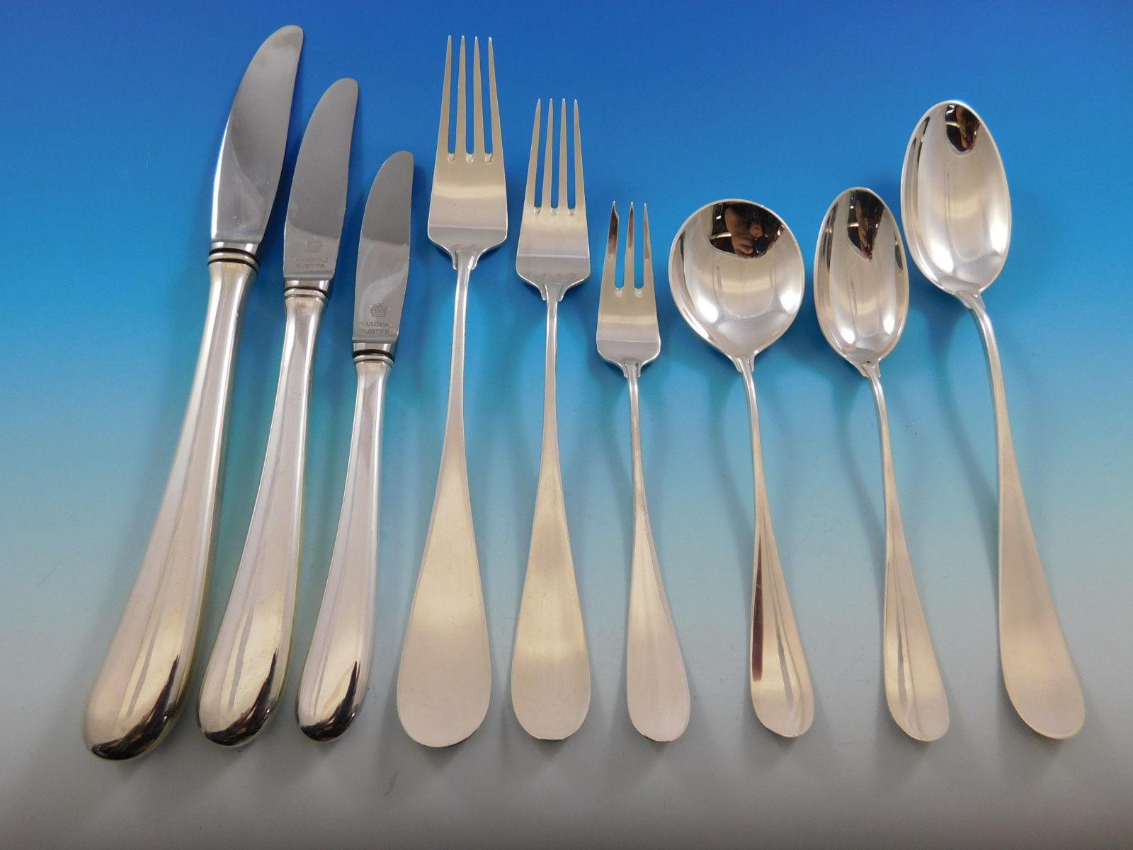 Large dinner and luncheon Scandinavian Modern Classic by Michelsen sterling silver flatware set, 82 pieces. This set includes:

Eight dinner size knives, 9 1/4