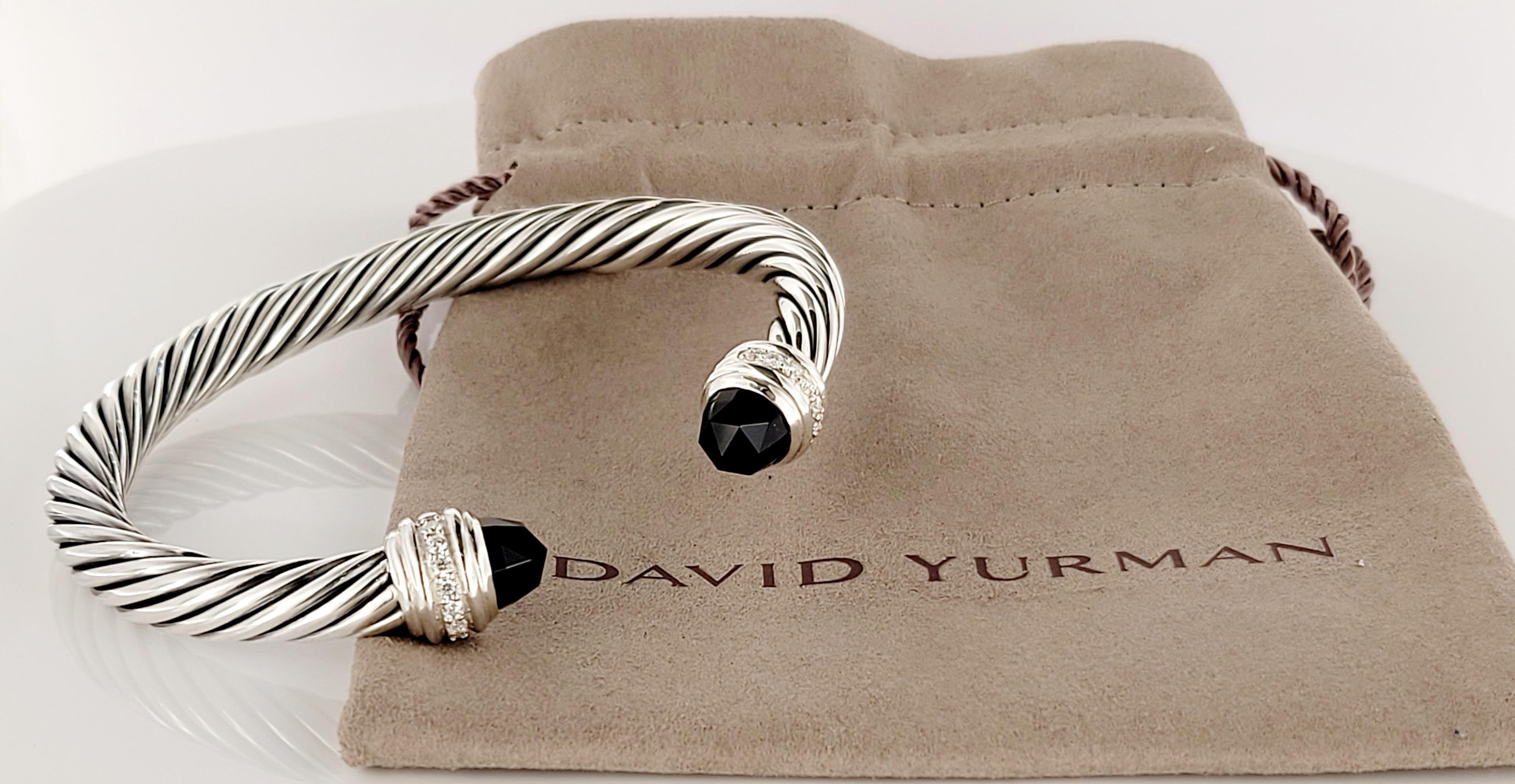 Brand David Yurman
Sterling Silver
Bracelet width 7mm
Mint condition 
Black Onyx
Pave- stone diamond 0.41ct
Weight 43.7gr
Retail price$ 1700
Comes with David Yurman pouch