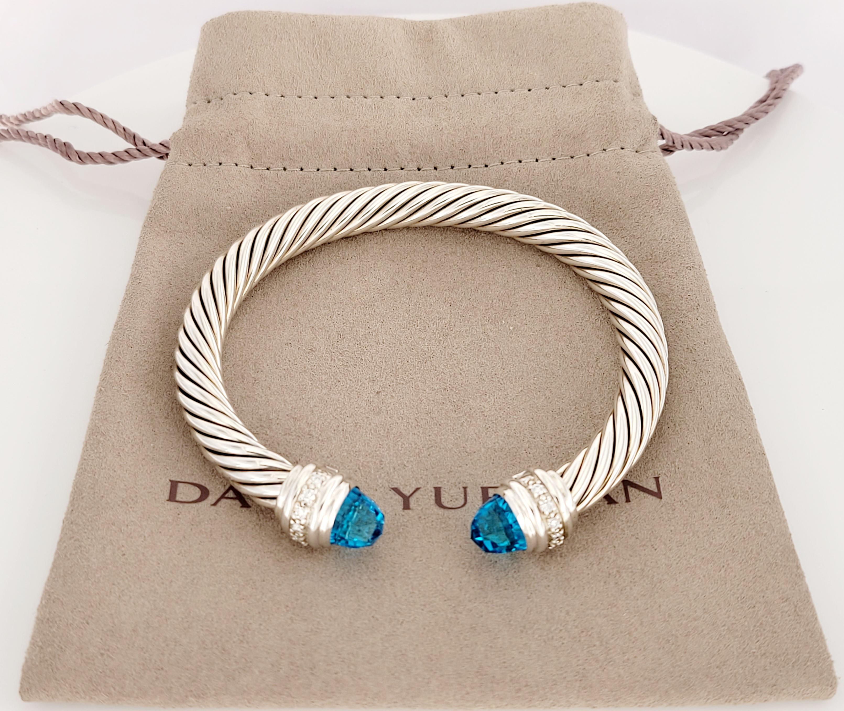 David yurman
Sterling Silver 
Condition New
Blue topaz 
Pave-Set Diamonds 0.41 Total carat weight 
Bracelet 7mm
Weight 40.3gr
Retail price $1900
Comes with David Yurman pouch