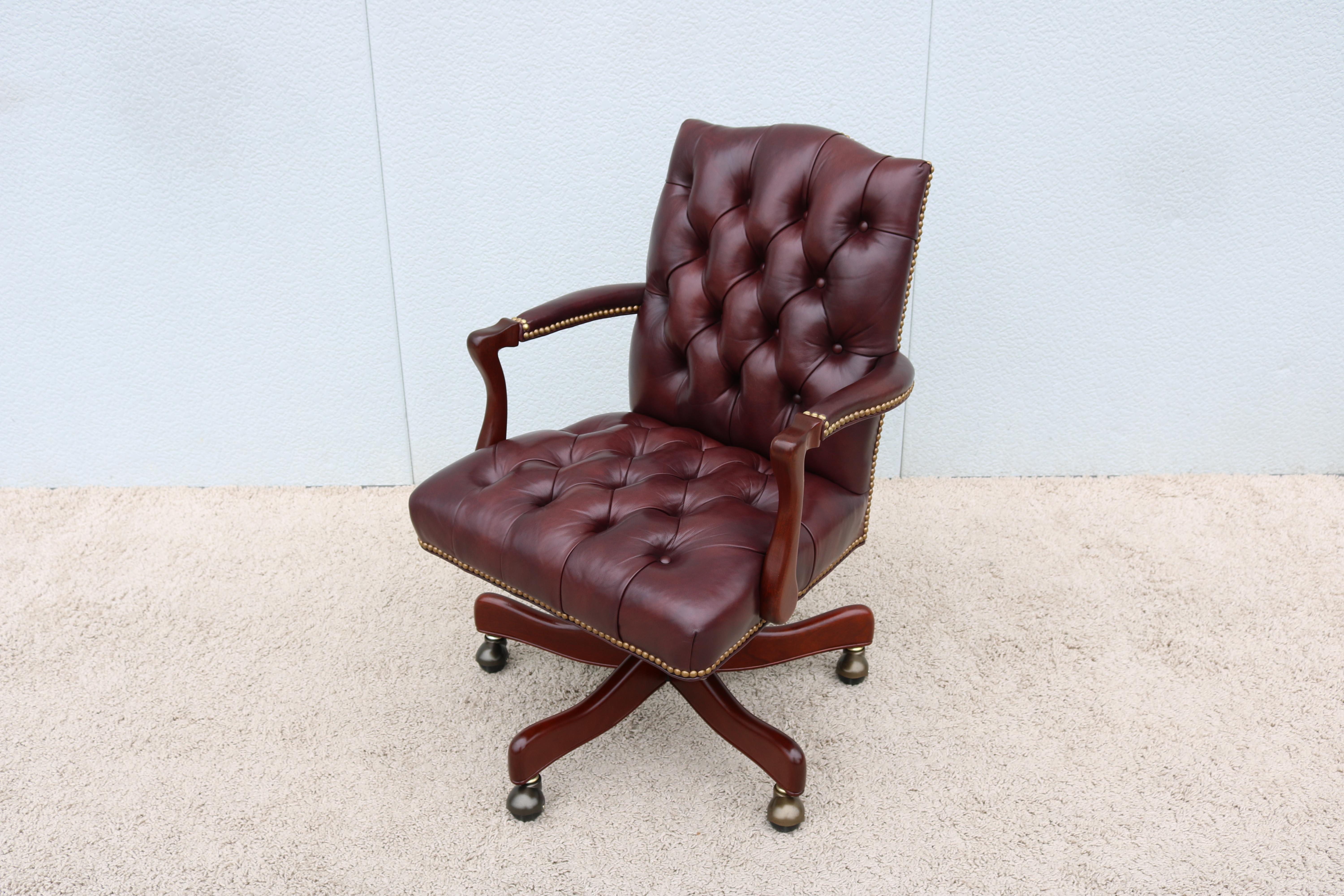 Fabulous traditional Graham deep button tufted leather swivel and tilt executive desk chair by Cabot Wrenn. 
A classic timeless and luxurious style inspired by the 18th and 19th century design.
Beautifully handcrafted by skilled artisans using