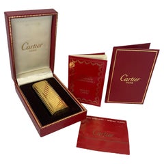 Classic Cartier 18ct Gold Plated Cigarette Lighter Boxed 
Velvet Cartier Pouch