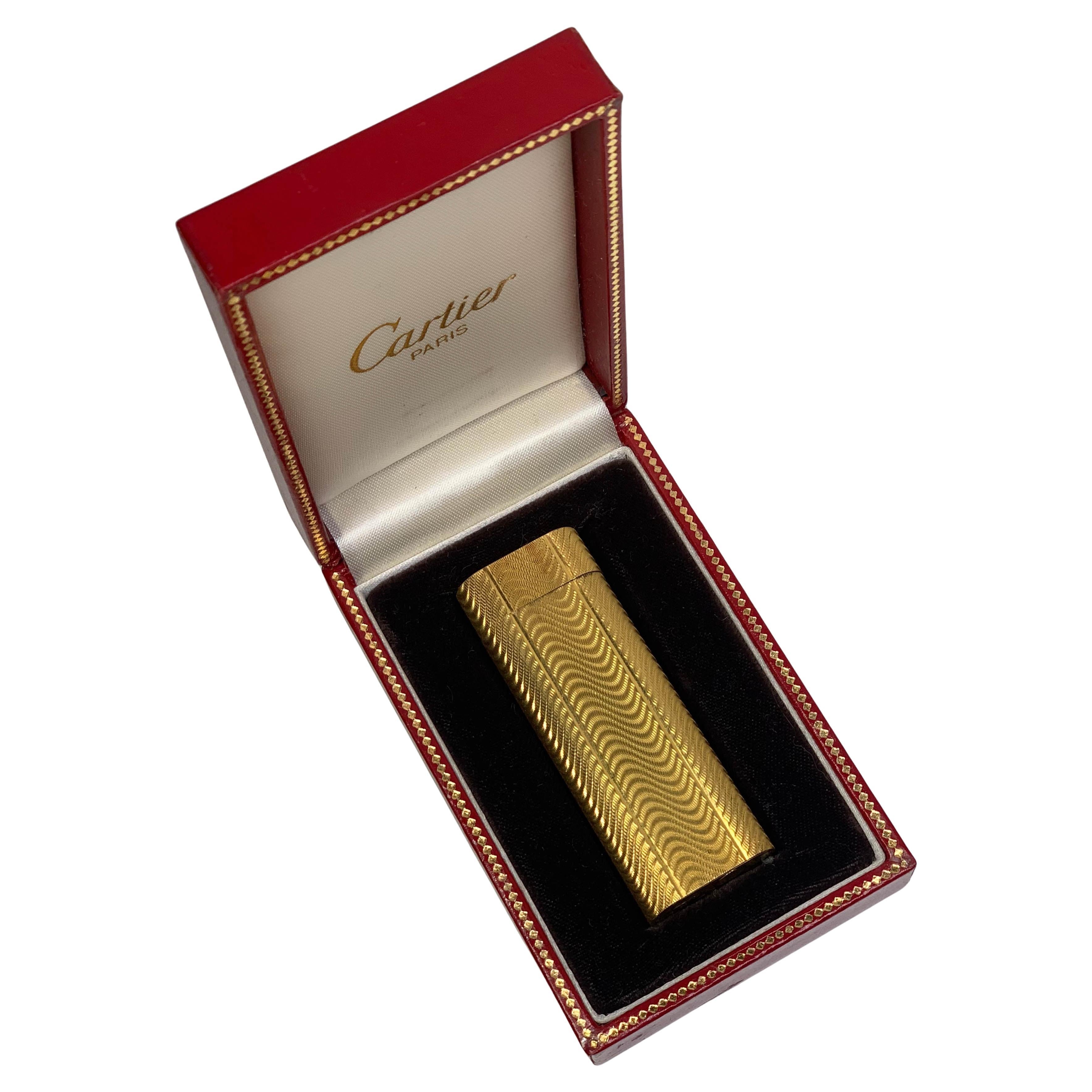 Classic Cartier 18ct Gold Plated Cigarette Lighter Serviced With A Red Cartier Box Serviced

Fully Serviced working makes for an ideal gift.