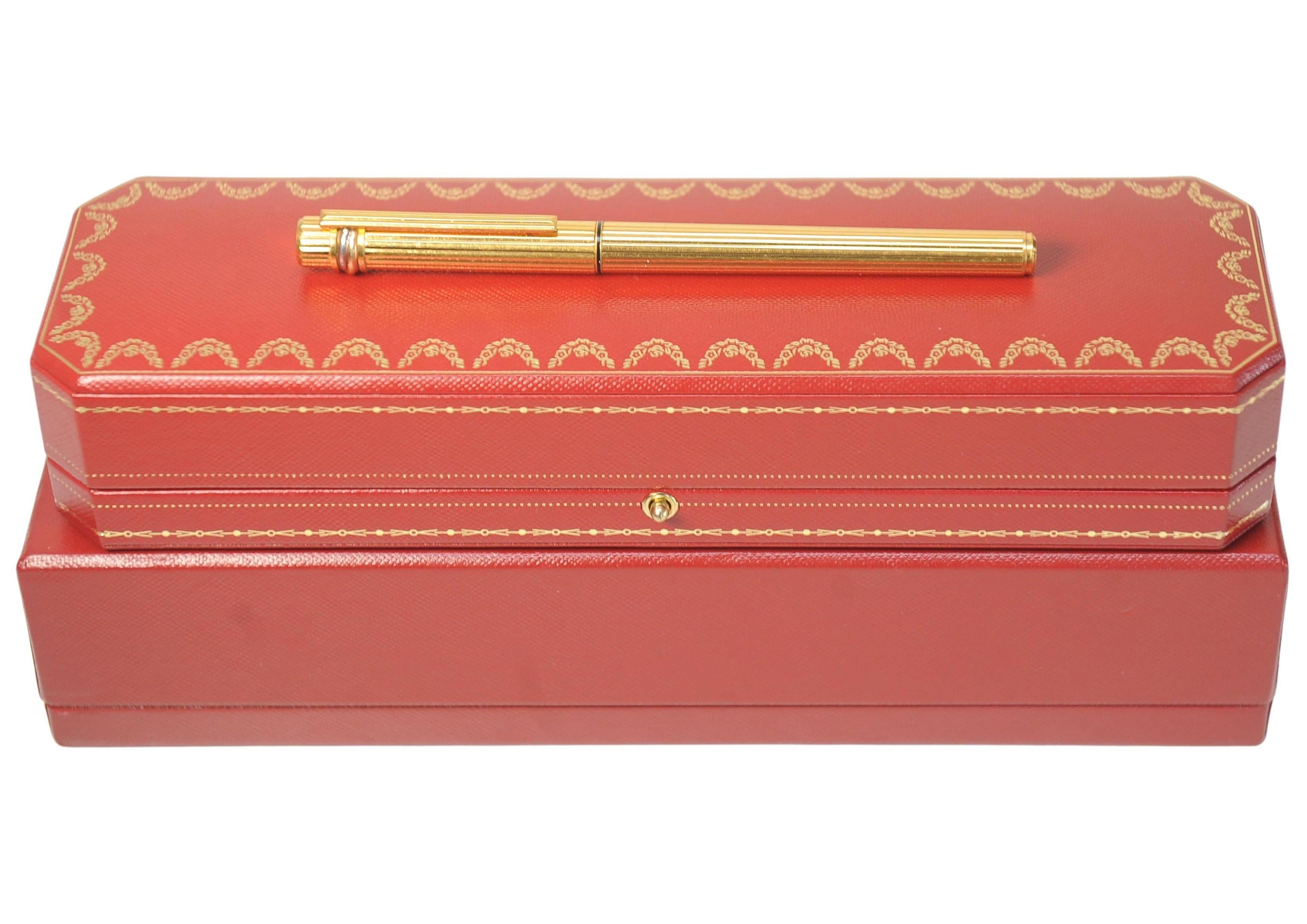 Classic Cartier 18ct Gold Plated Ribbed Trinity Rollerball Pen & Cartier Box For Sale 8
