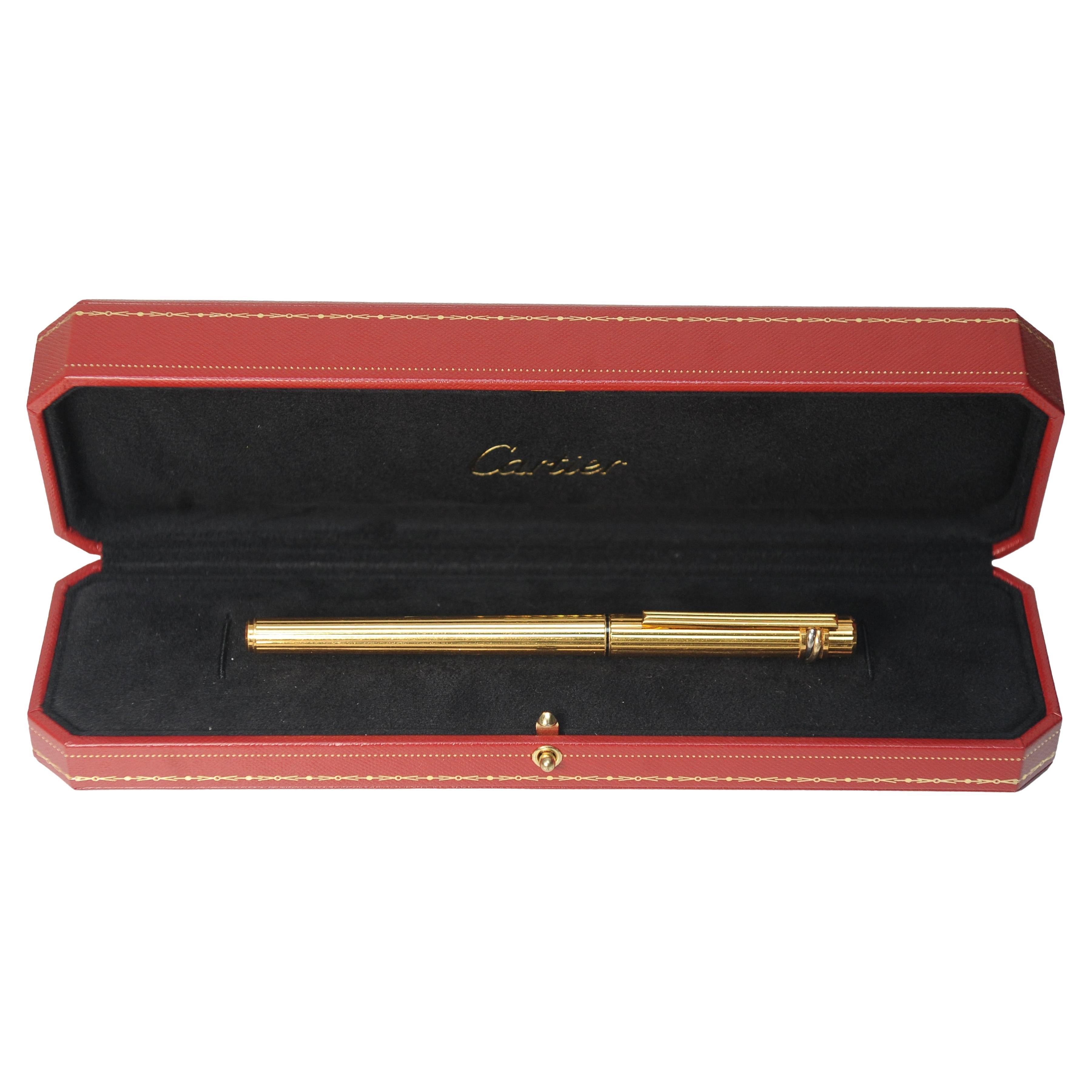 Art Deco Classic Cartier 18ct Gold Plated Ribbed Trinity Rollerball Pen & Cartier Box For Sale