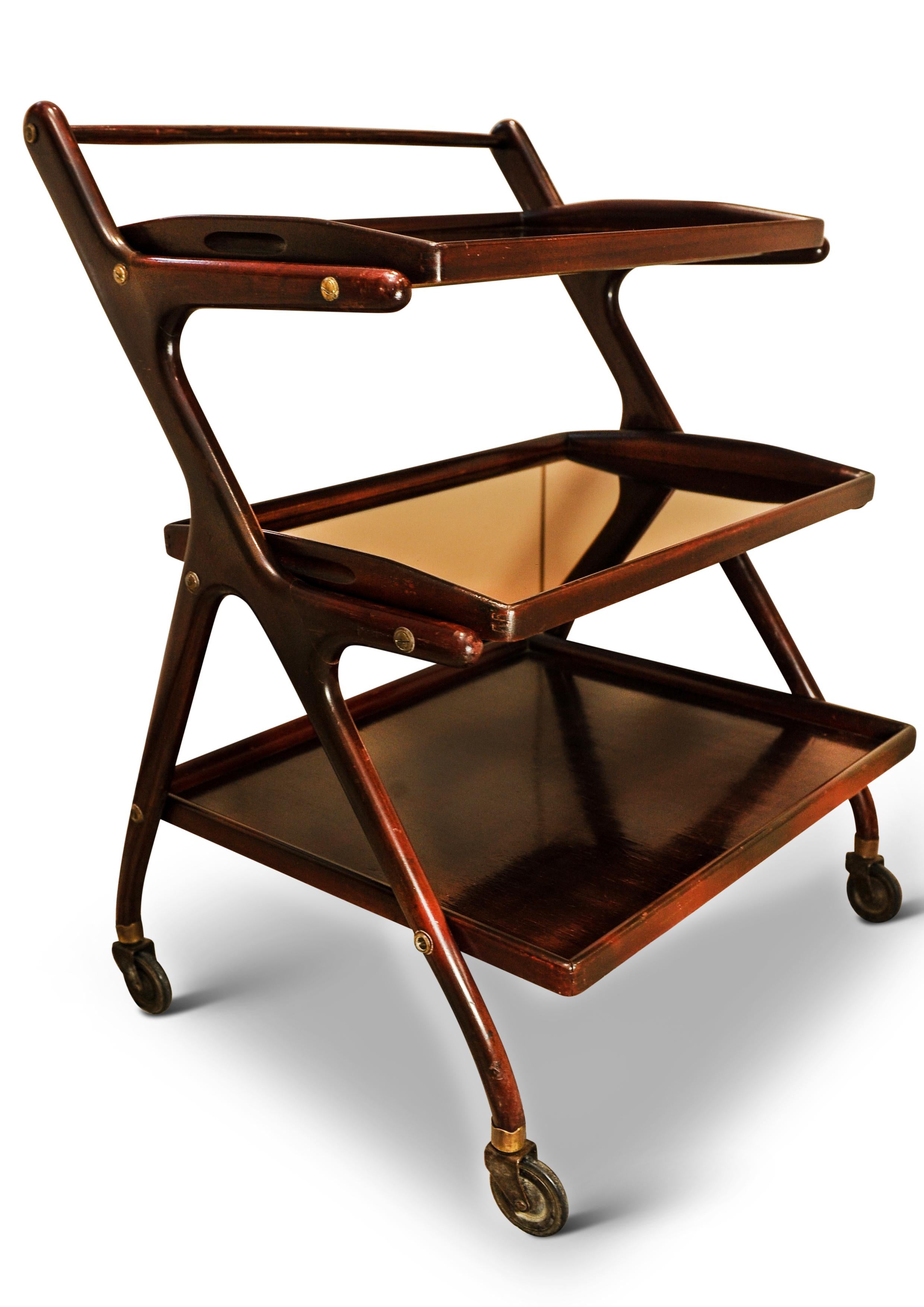 Elegant 39 Cesare Lacca Italian Mid-Century Two Tier Mahogany and Brass Drinks Trolley With Peach Mirror Removable Trays 

Cesare Lacca (1913-1978) was an Italian furniture designer and interior decorator who gained fame in the mid-20th century. His
