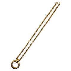 Classic Chanel 1980s Gold Long Ring Pendant Necklace