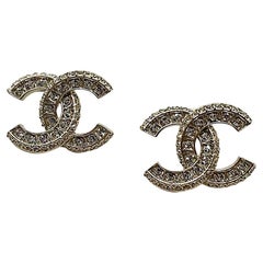 Classic CHANEL CC Stud Earrings In Gilt Metal and Rhinestones