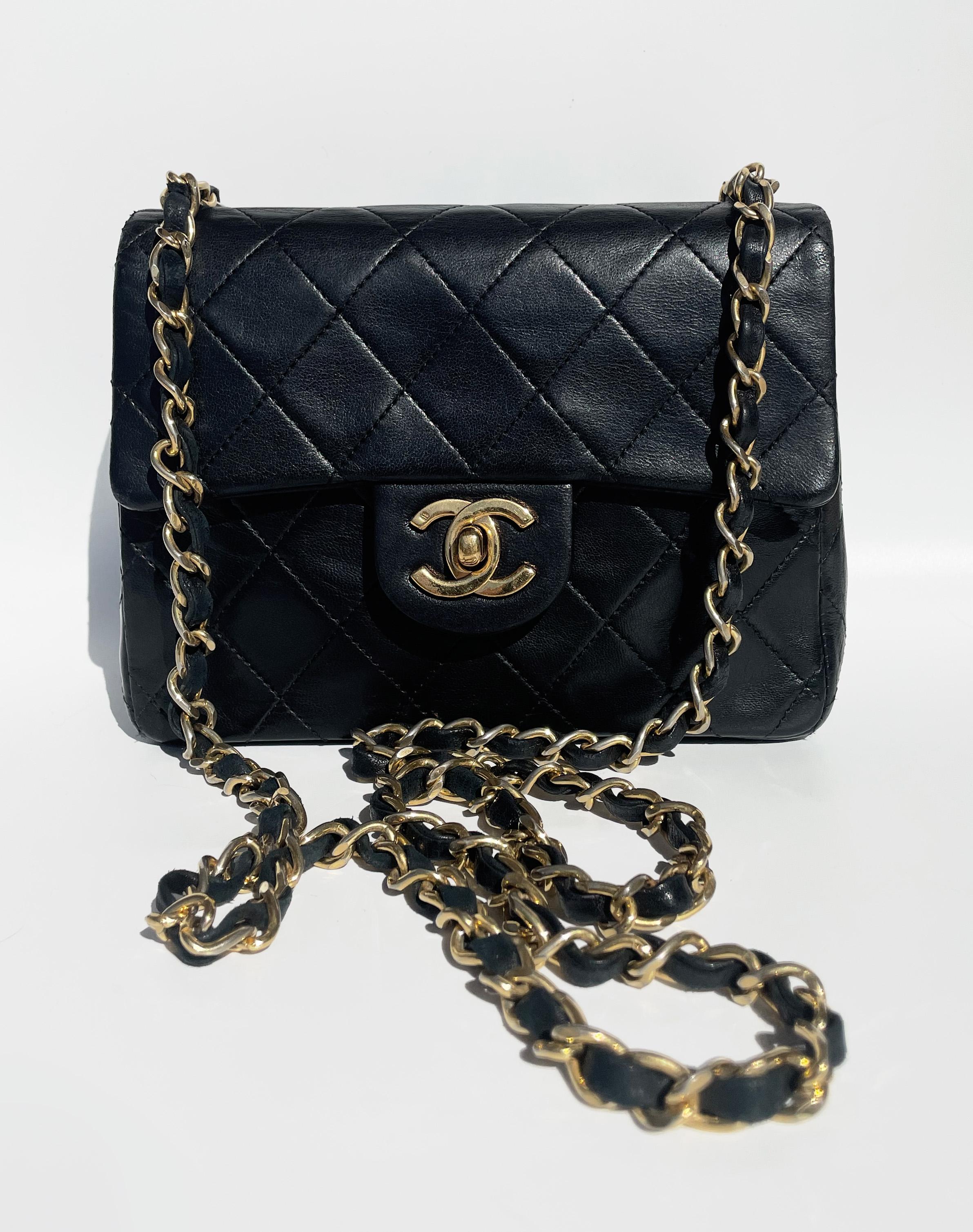 Classic Chanel Mini Timeless handbag in black quilted leather In Good Condition For Sale In CANNES, FR