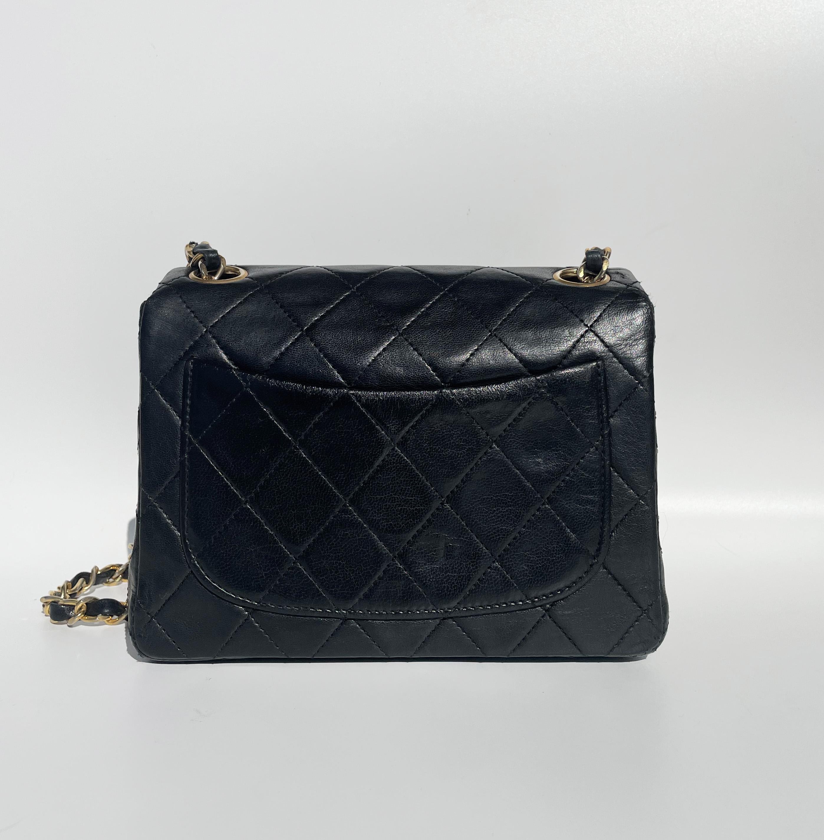 Classic Chanel Mini Timeless handbag in black quilted leather For Sale 4