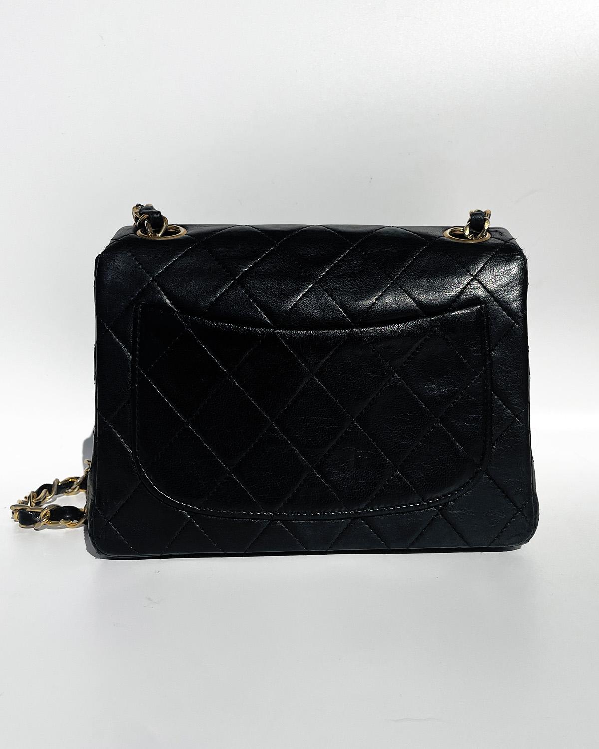 Classic Chanel Mini Timeless handbag in black quilted leather For Sale 5