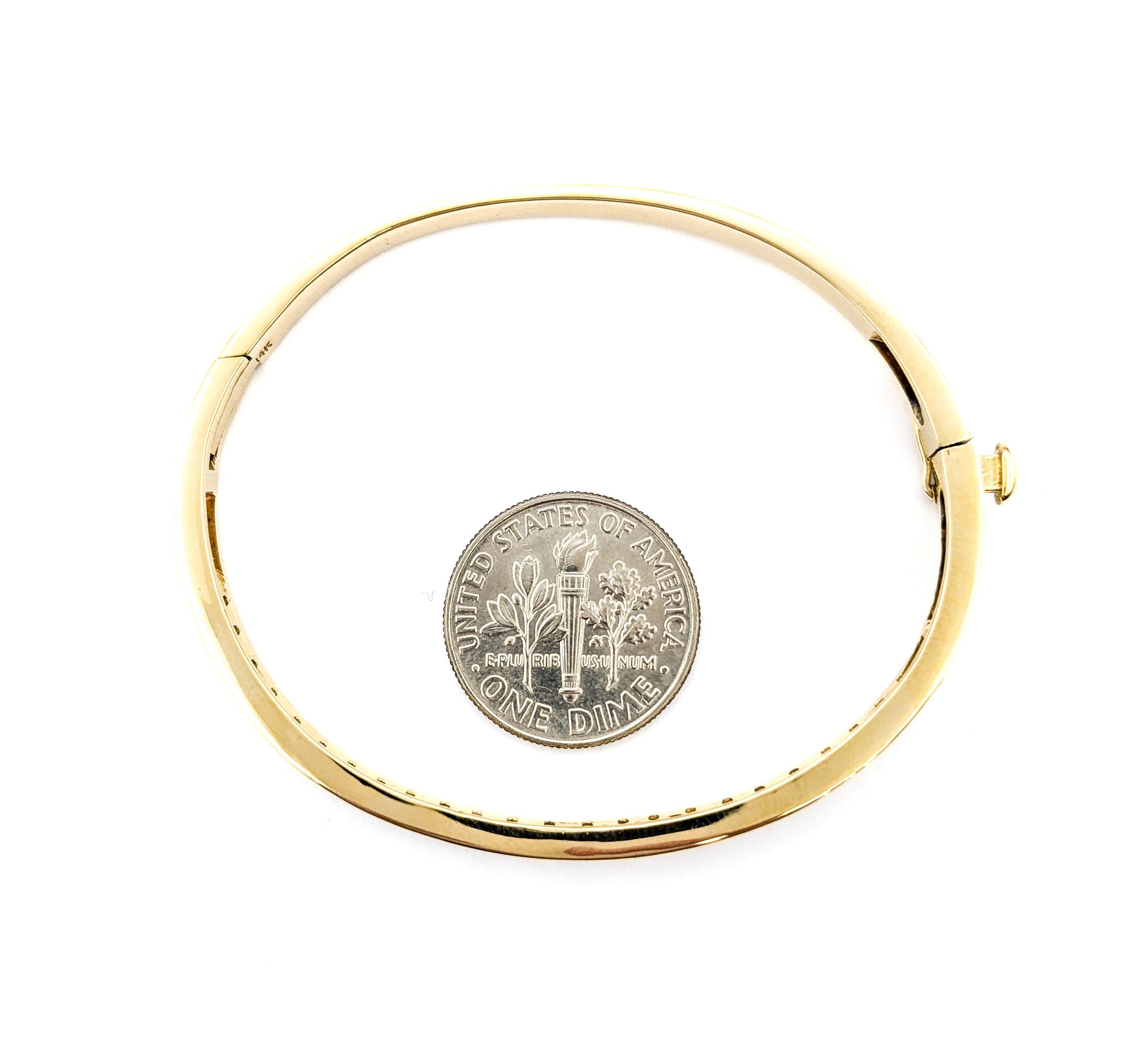 Classic Channel Set Diamond Hinged Bangle in Yellow Gold 3