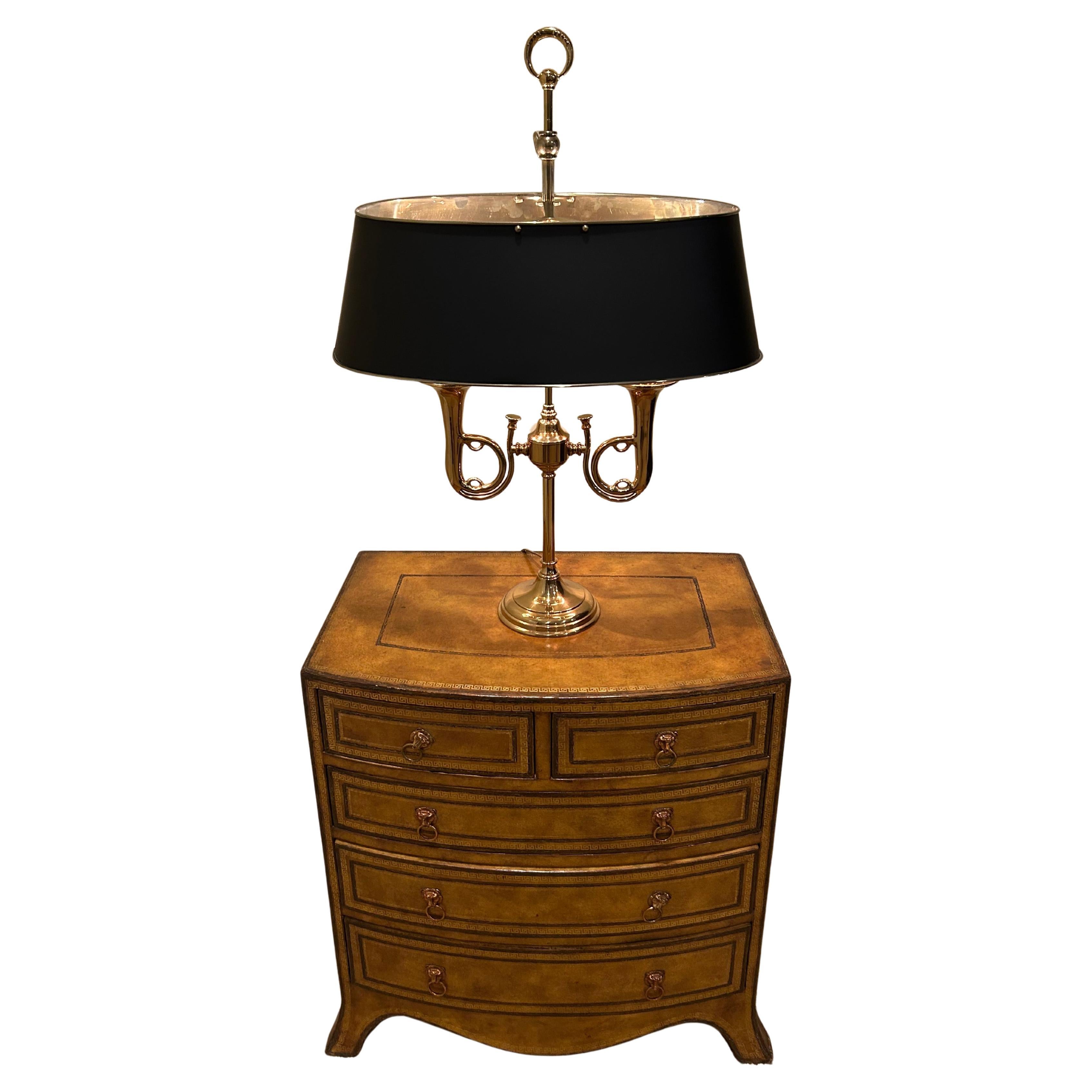 Classic Chapman brass adjustable buillotte table lamp having horn motif and impressive unusual oblong black metal shade.