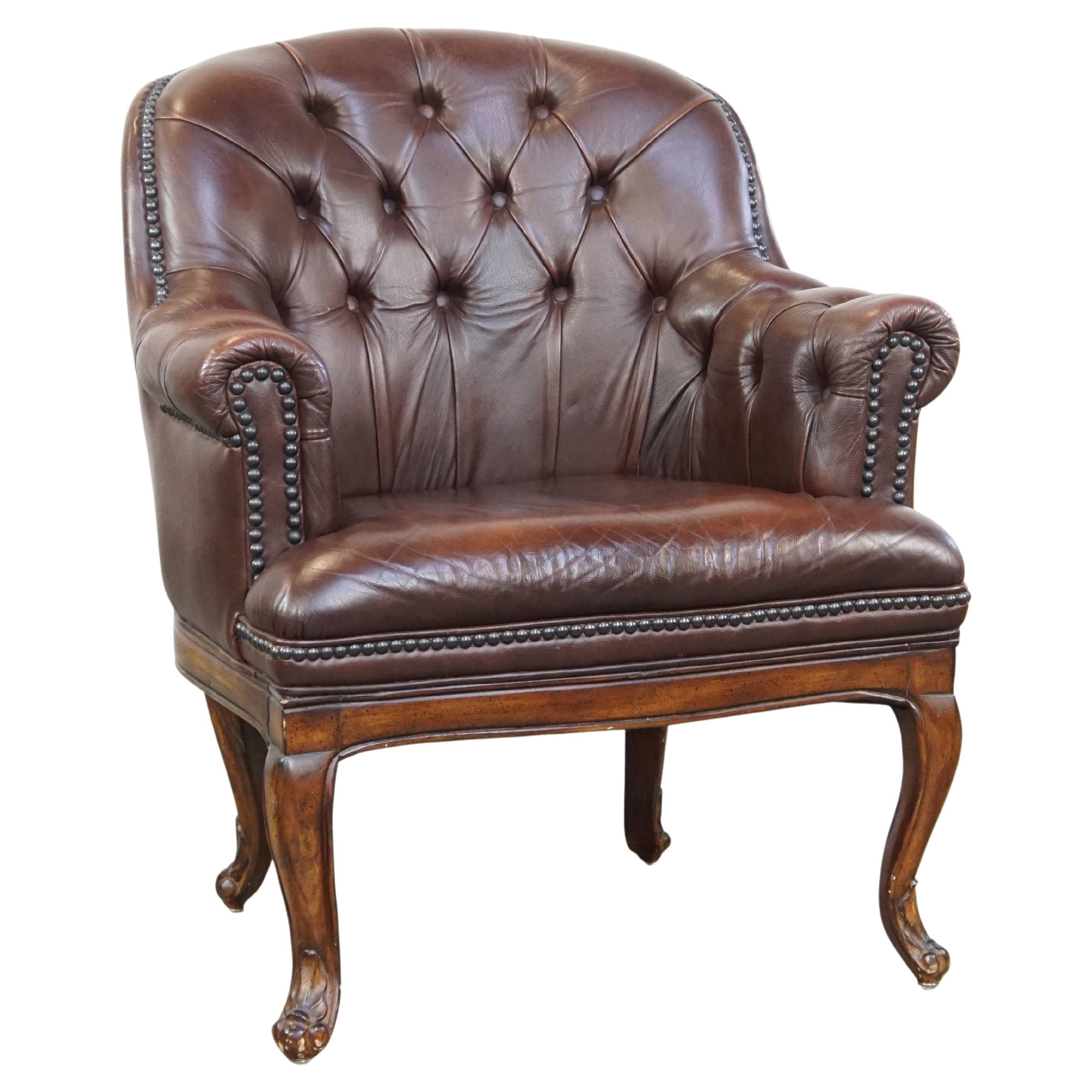Classic, charming, properly finished cow leather English chesterfield armchair
